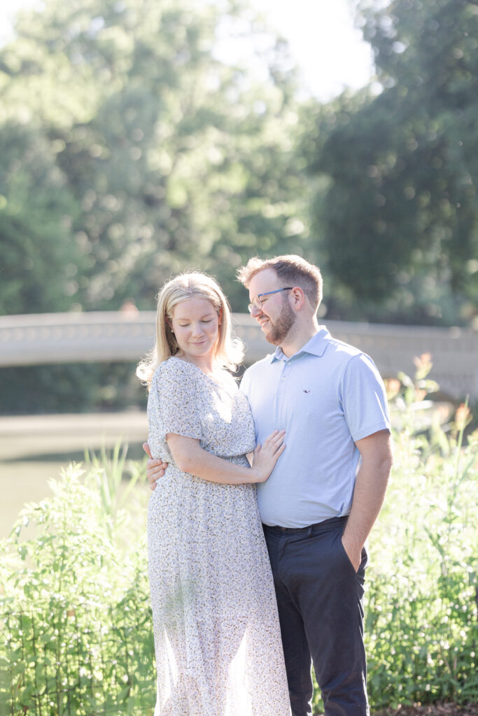 Central Park couple photos in front of Bow Bridge