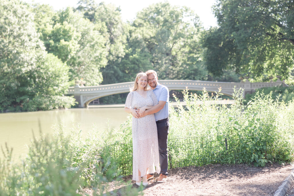 Central Park couple photos in front of Bow Bridge