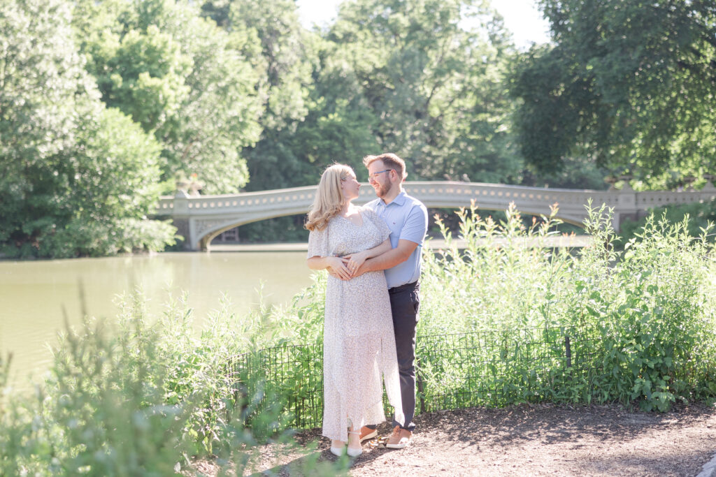 Central Park couple photos in front of Bow Bridge