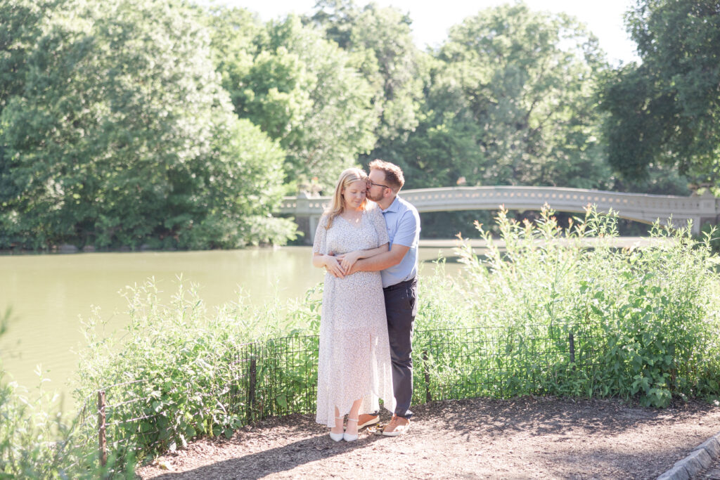 Central Park couple photos in front of Bow Bridge