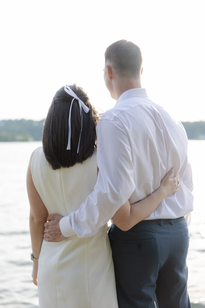 Couple photos in front of Lake Mohawk