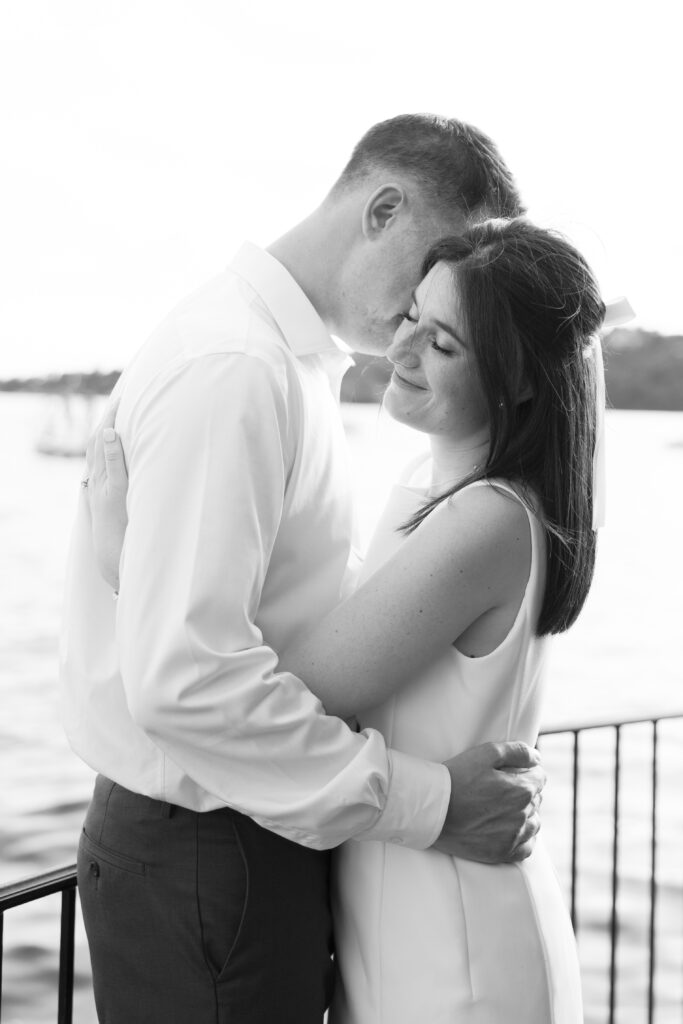 Black and white sunset engagement photos at Lake Mohawk NJ