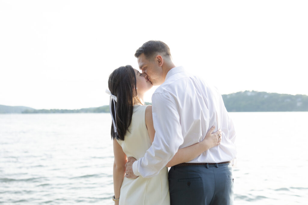 Couple photos in front of Lake Mohawk