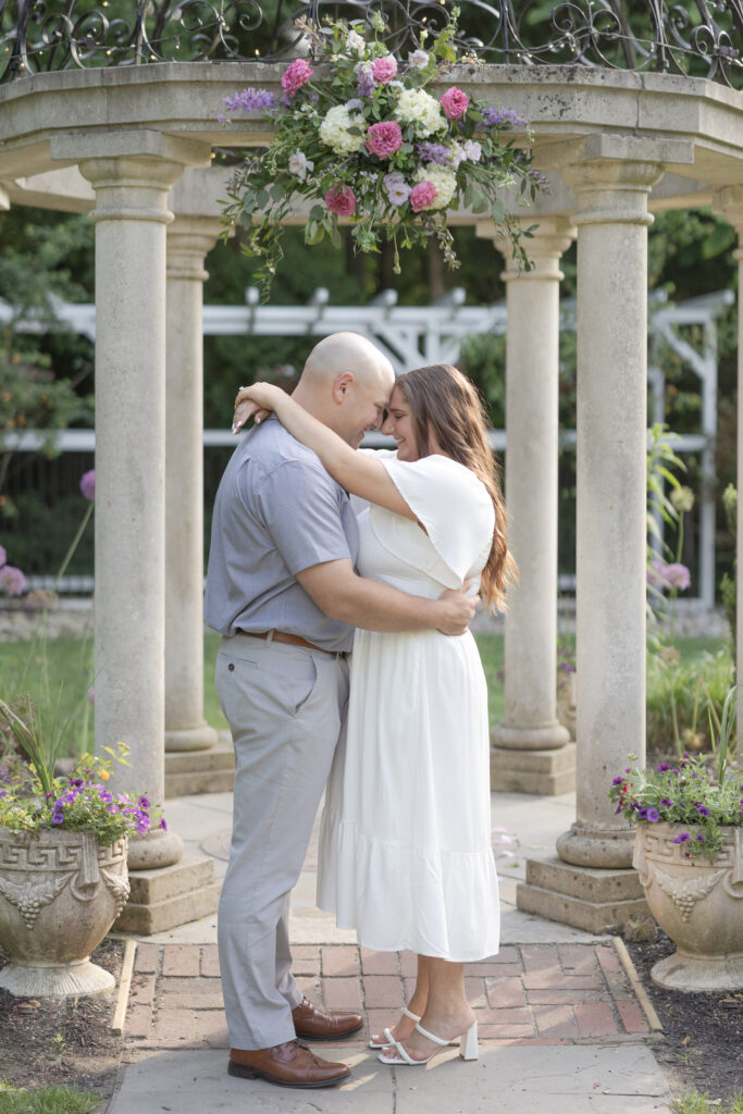 NJ Hamilton Township Engagement Photos in front of gazebo