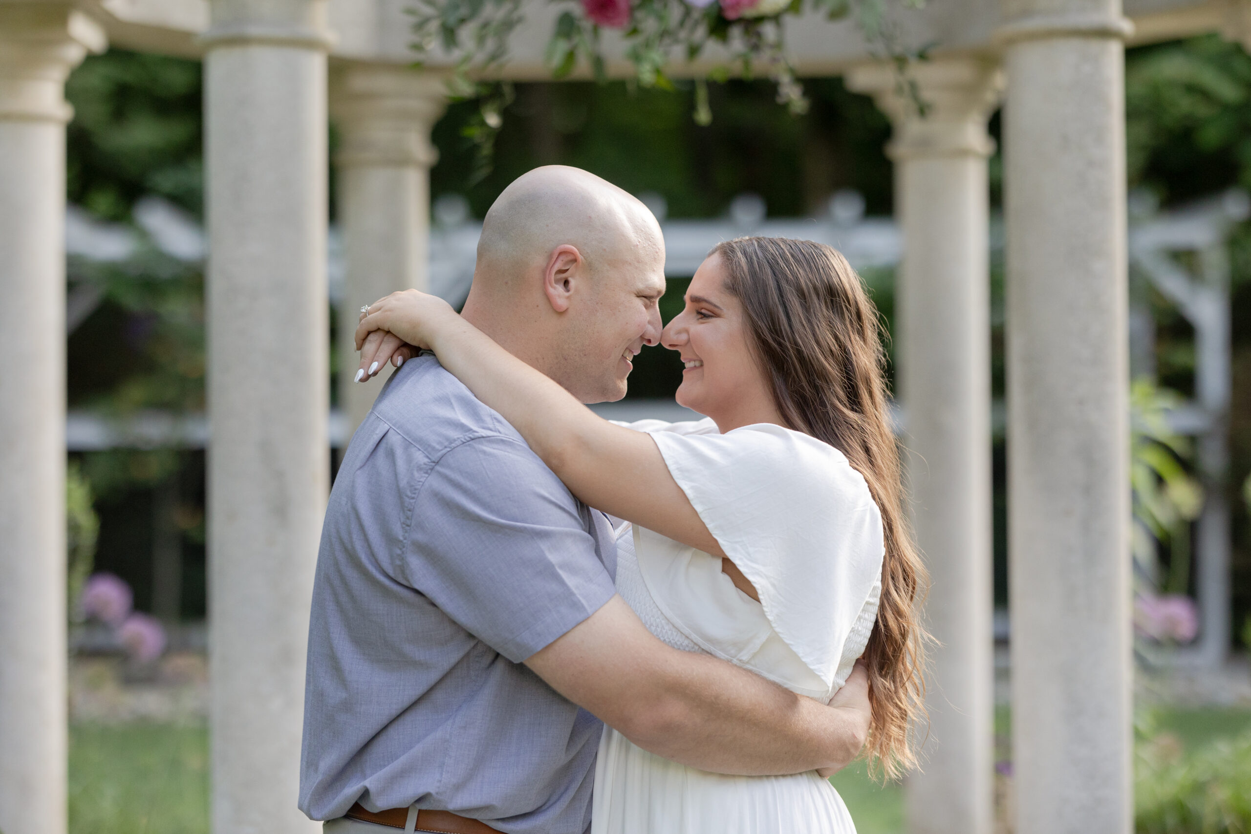 Romantic couple photo in front of gazebo