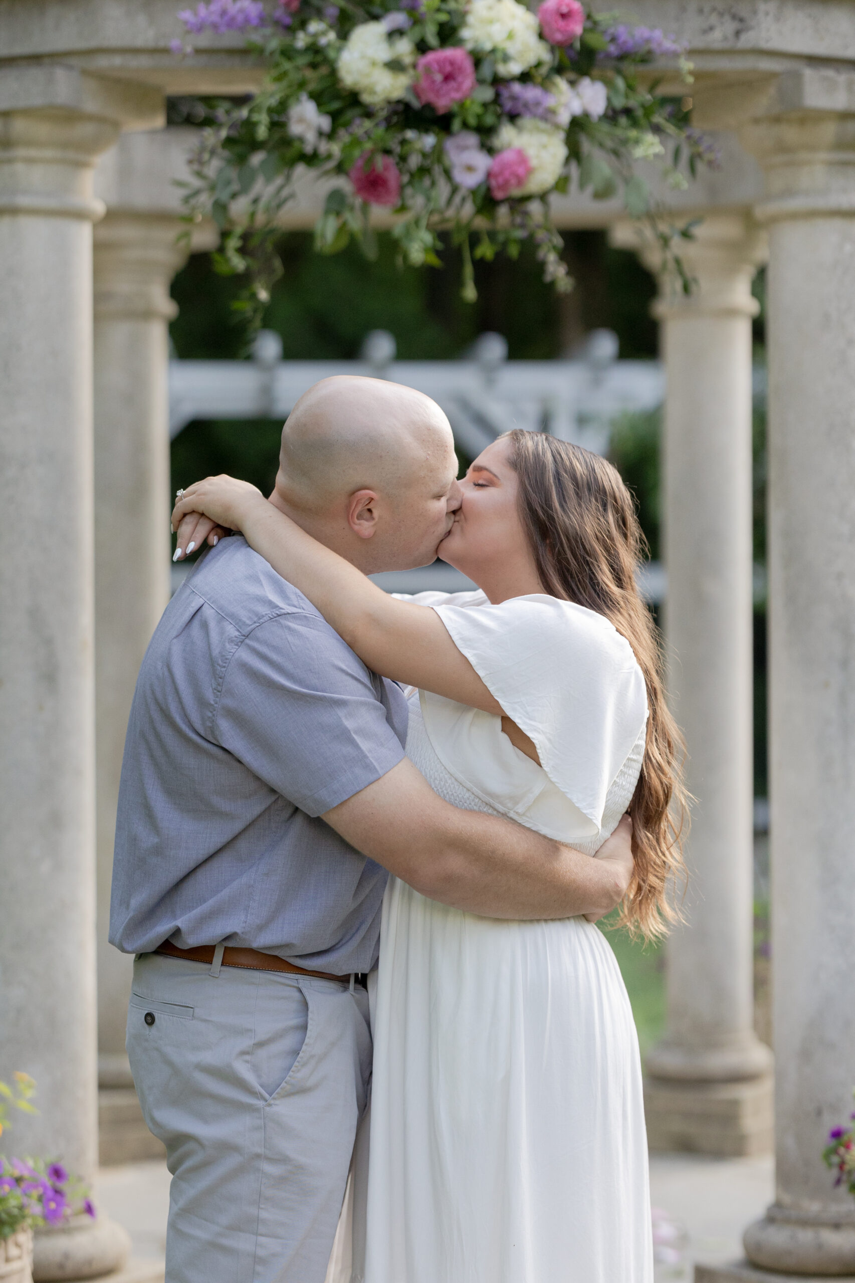 Romantic couple photo in front of gazebo