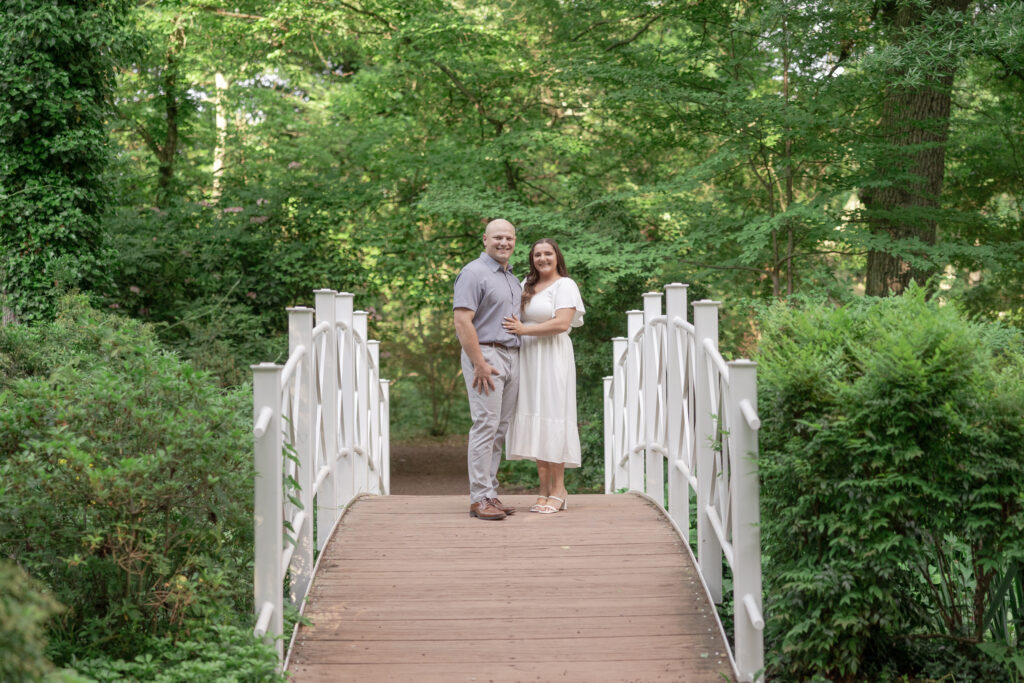 Sayen House and Gardens engagement photos on white bridge