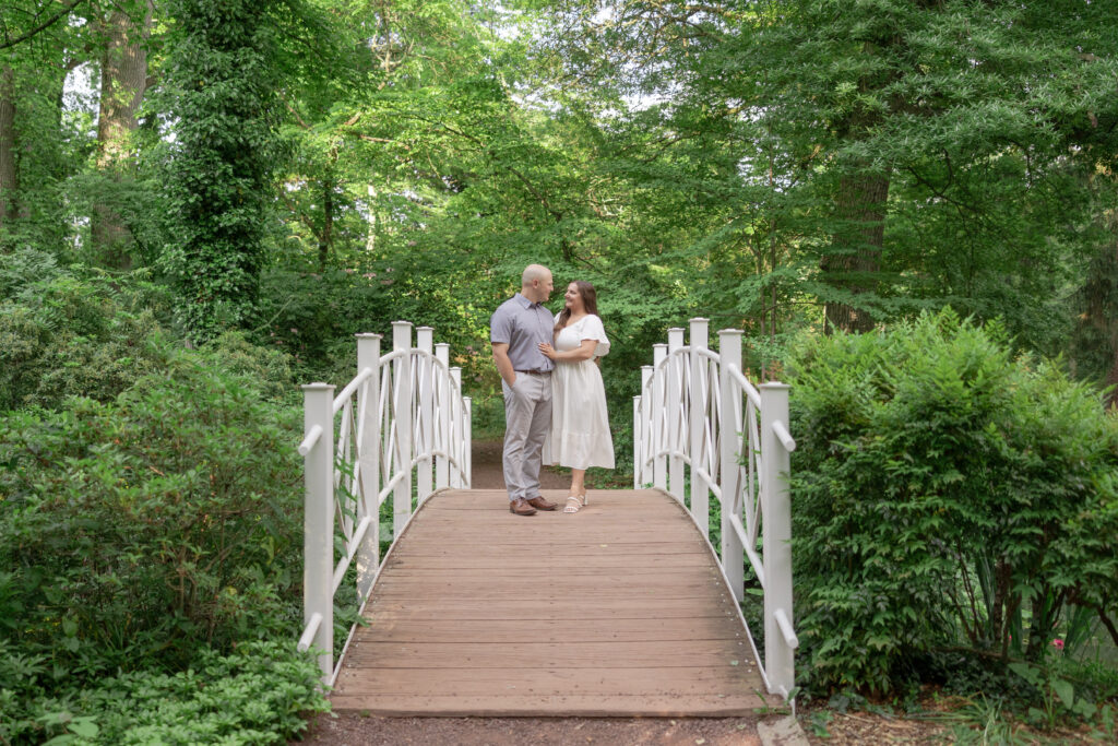 Sayen House and Gardens engagement photos on white bridge