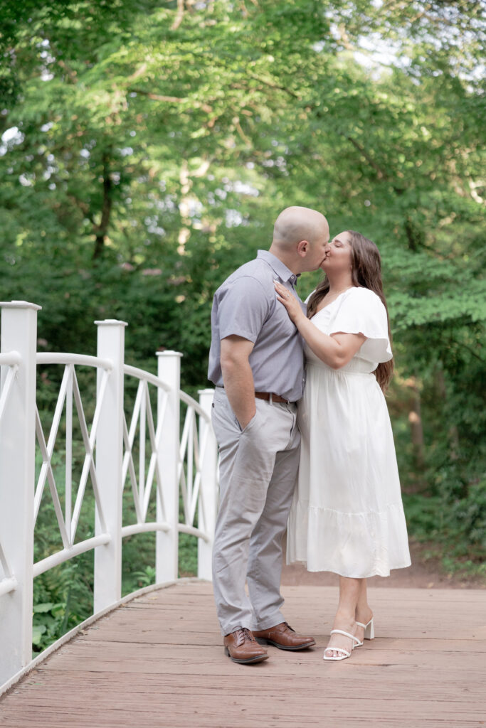 Sayen House and Gardens engagement photos on white bridge