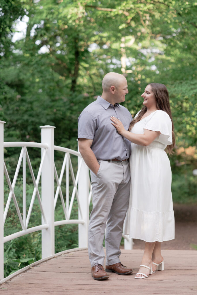 Sayen House and Gardens engagement photos on white bridge