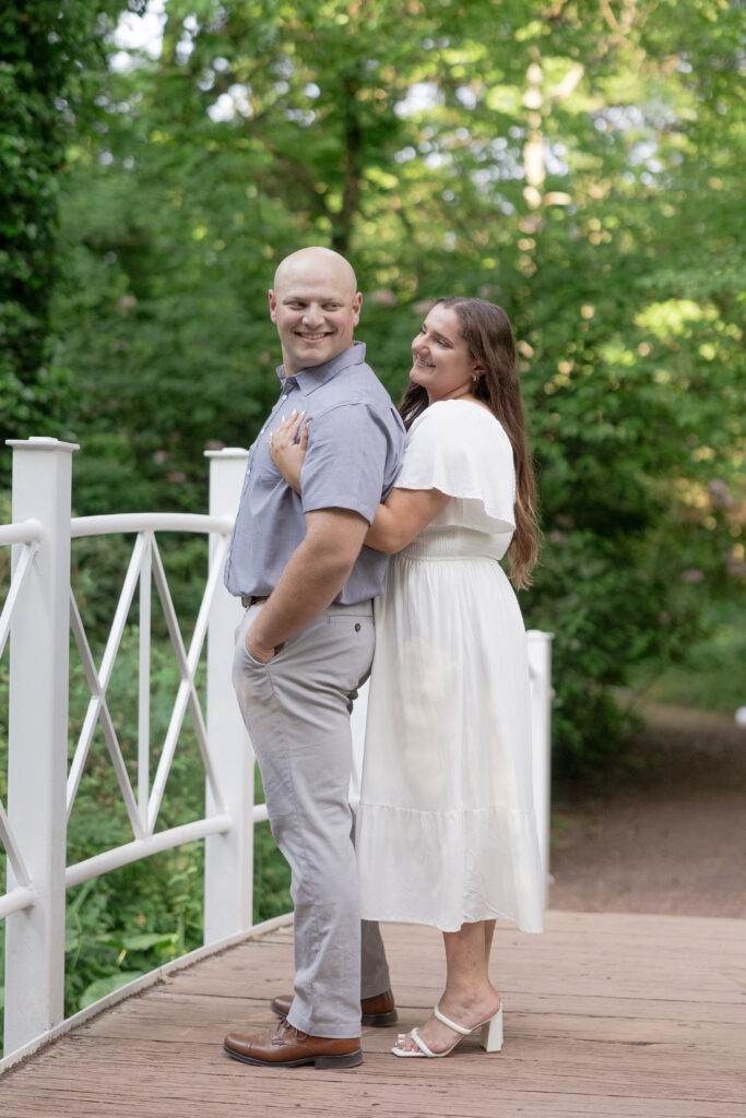 Sayen House and Gardens engagement photos on white bridge