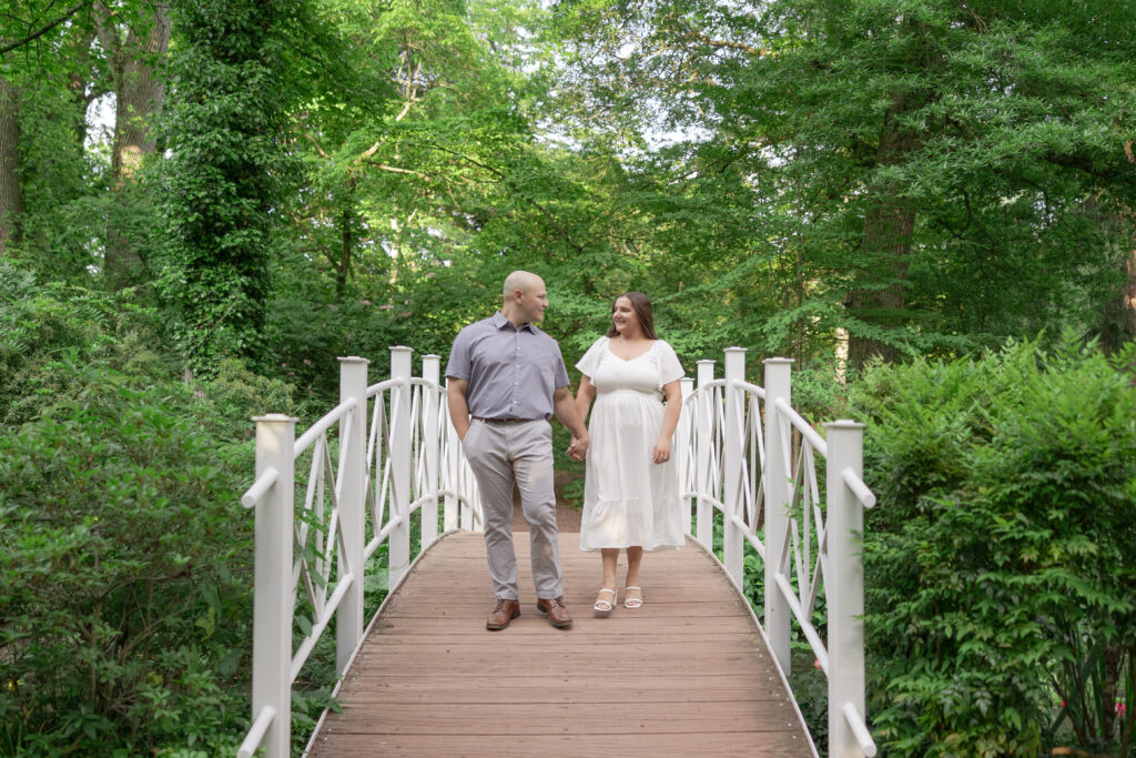 Sayen House and Gardens engagement photos on white bridge