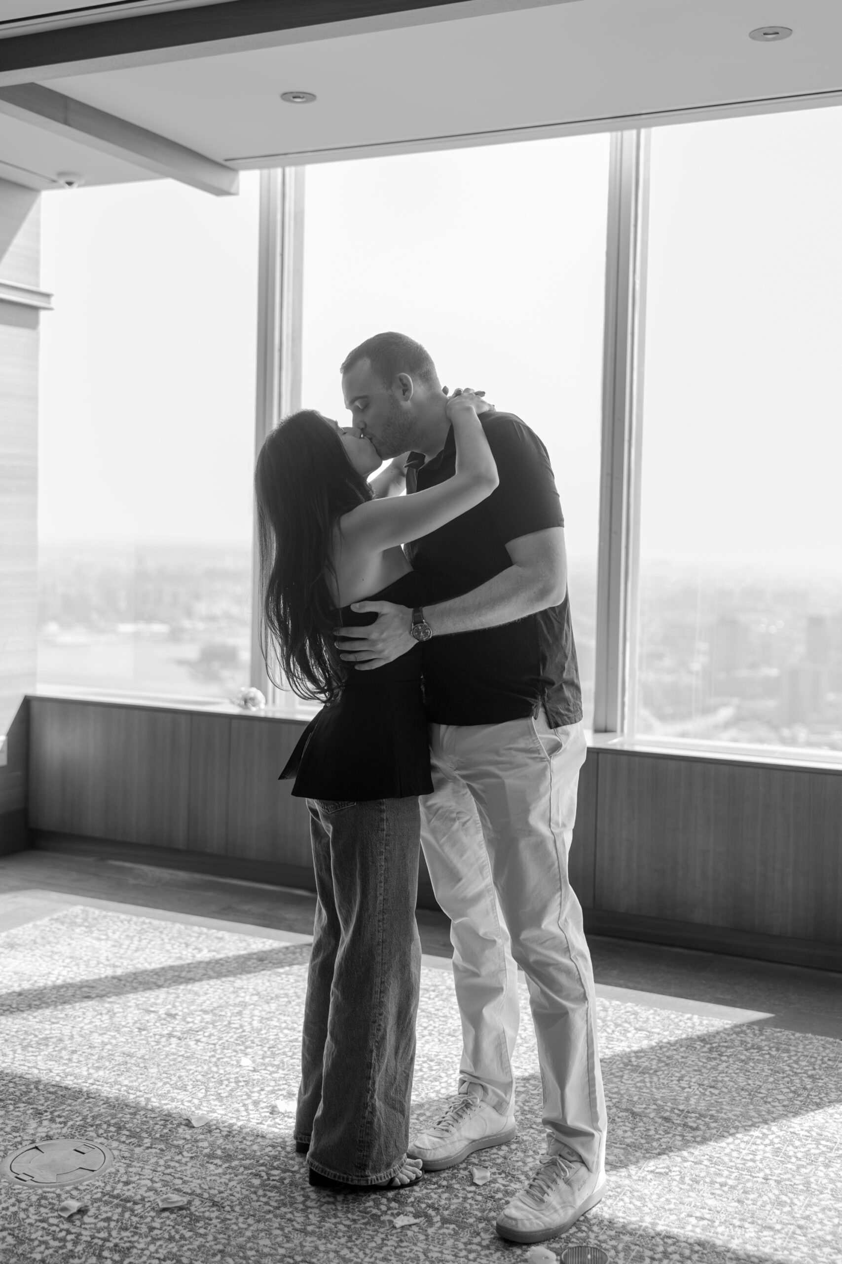 Black and white portraits of newly engaged couple