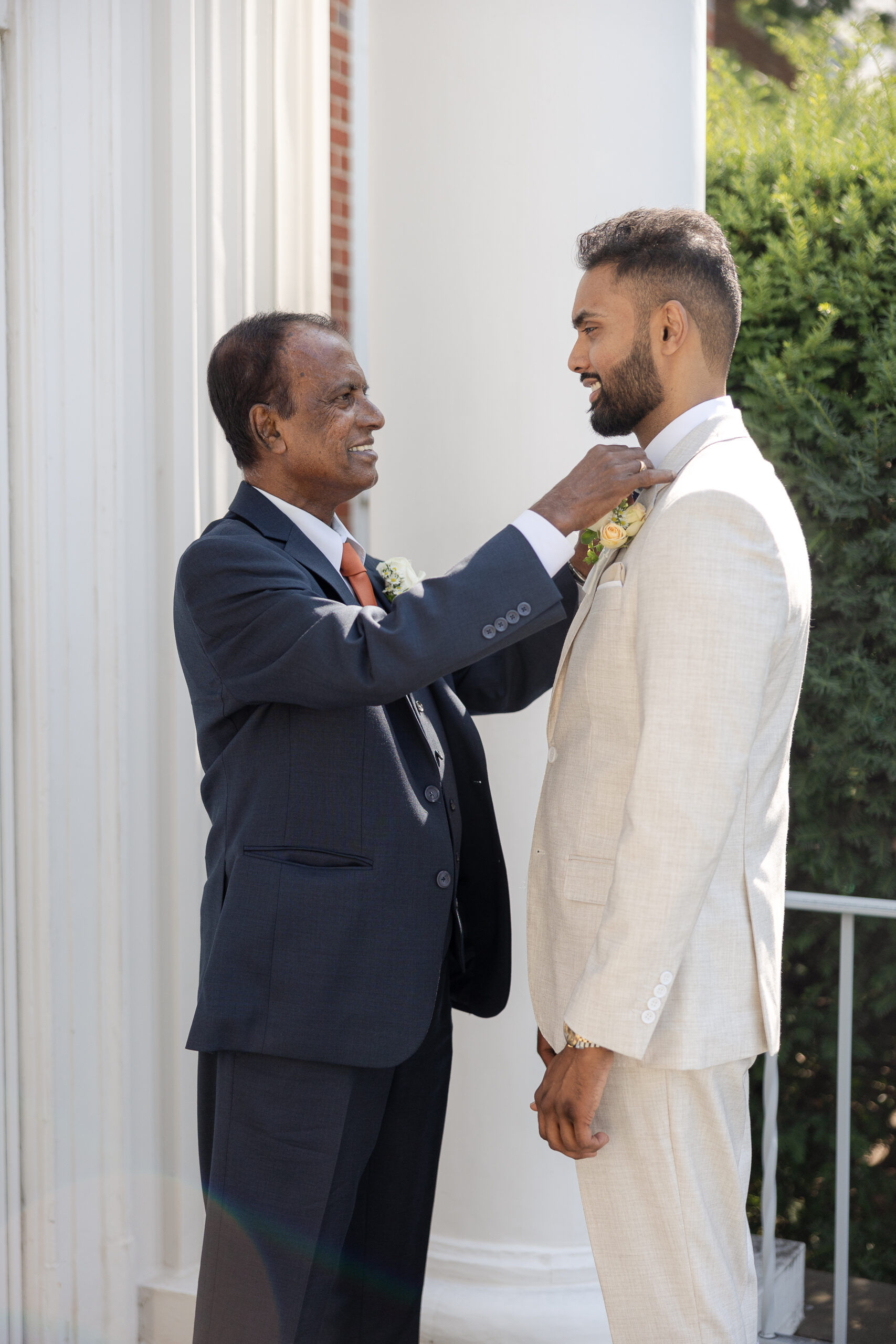 Groom getting dressed for NY Catholic Indian Wedding