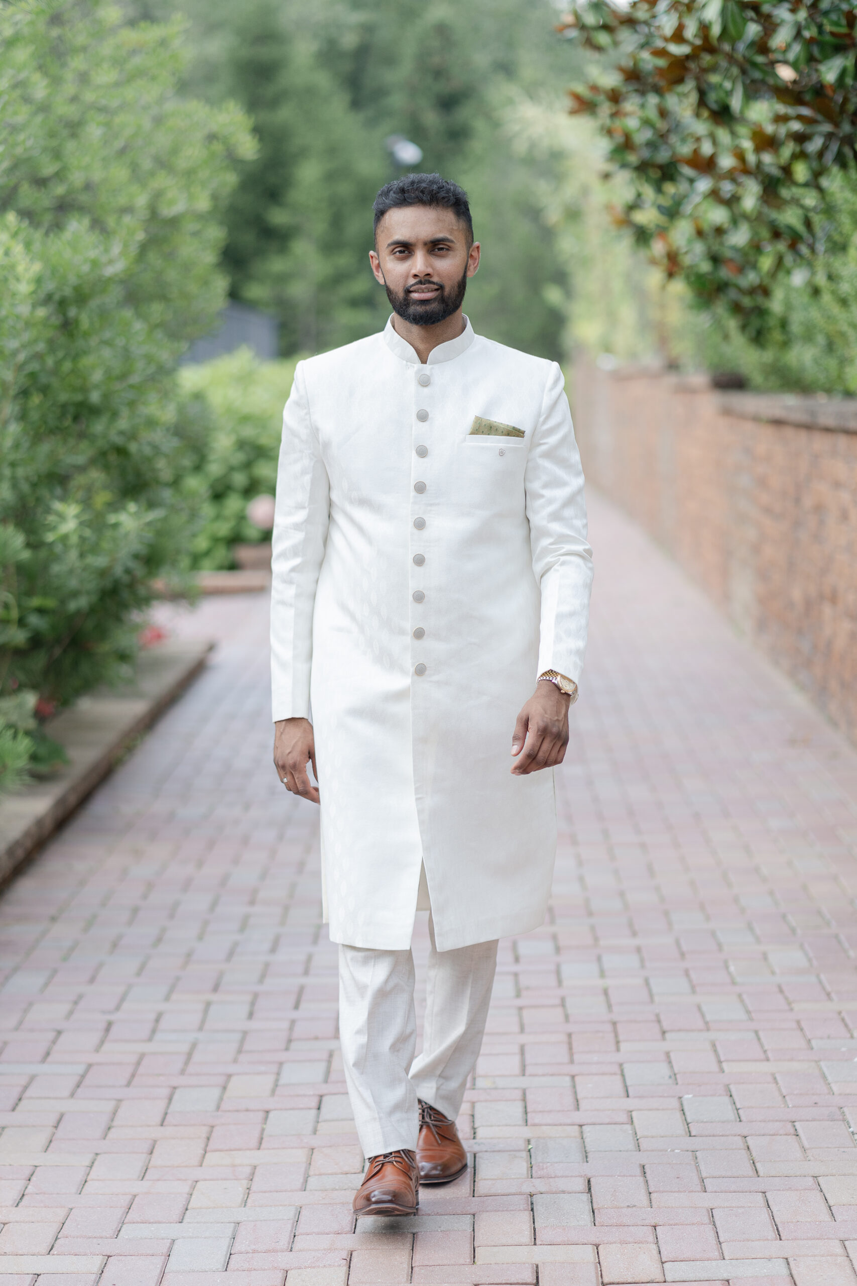 Groom portraits at Crest Hollow Country Club