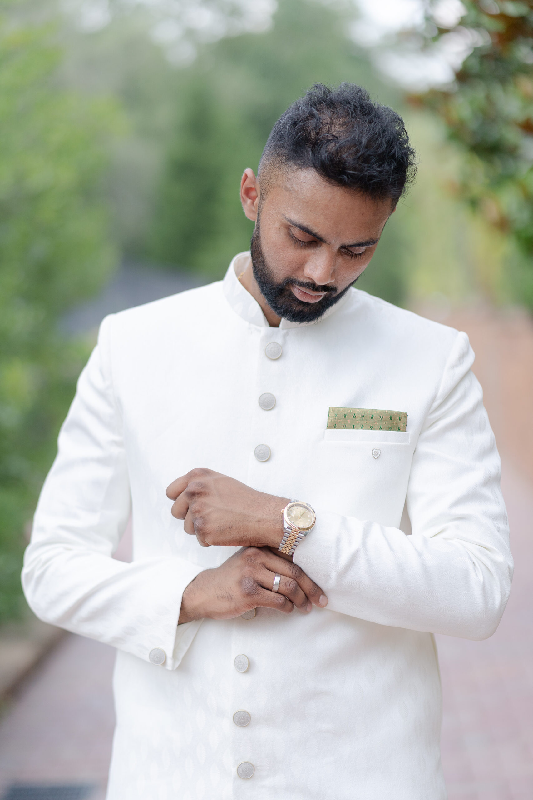 Groom portraits at Crest Hollow Country Club