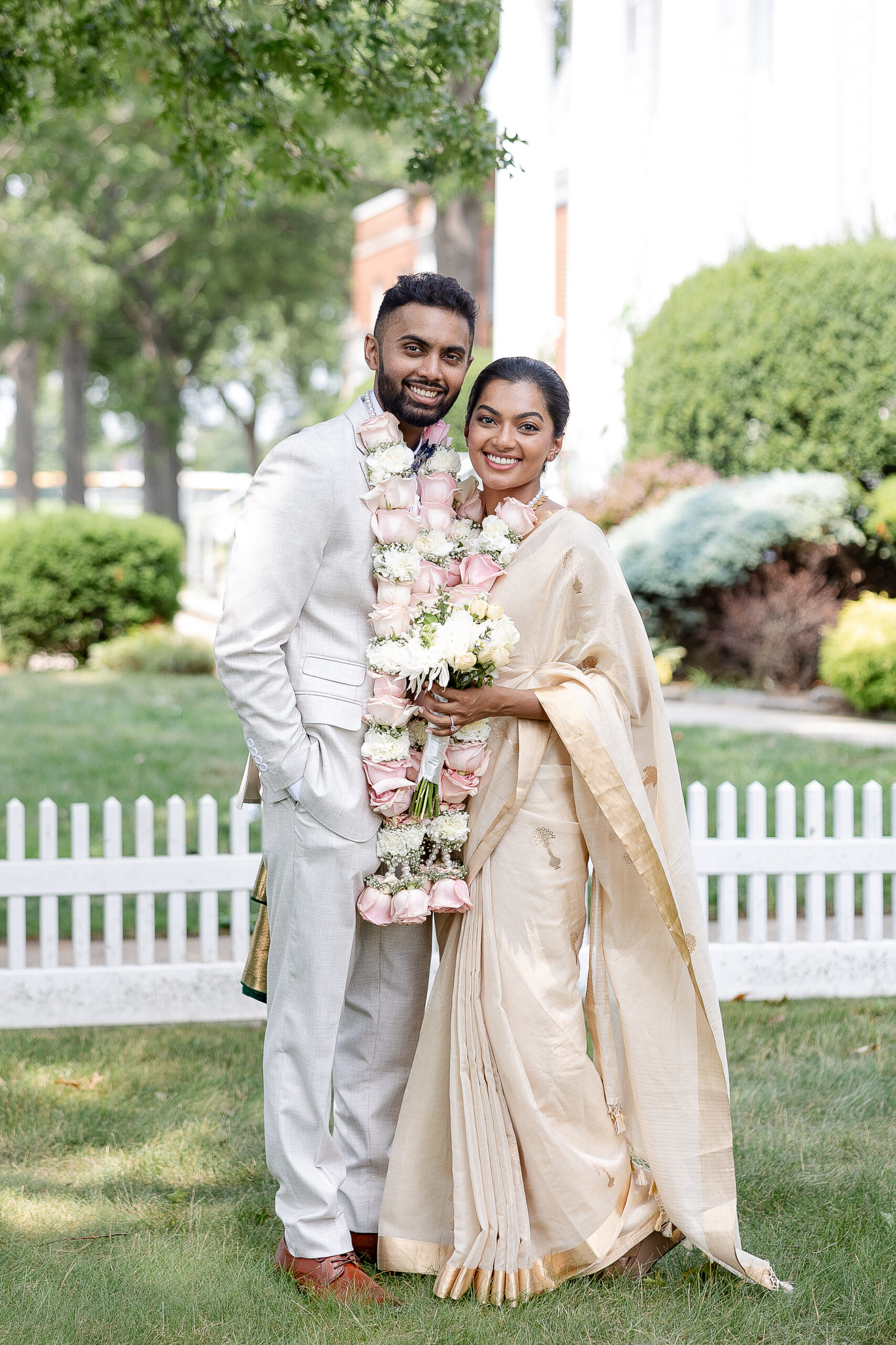 Outdoor bride and groom photos after Indian wedding ceremony
