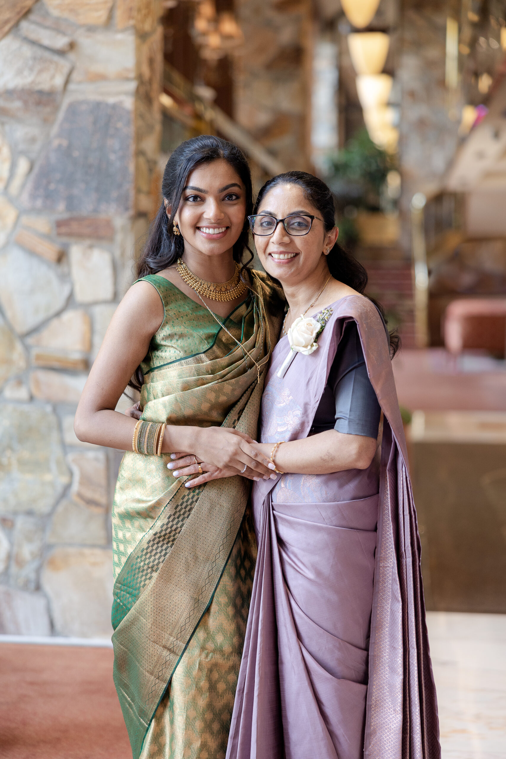 Bride and mom getting ready with Indian green saree