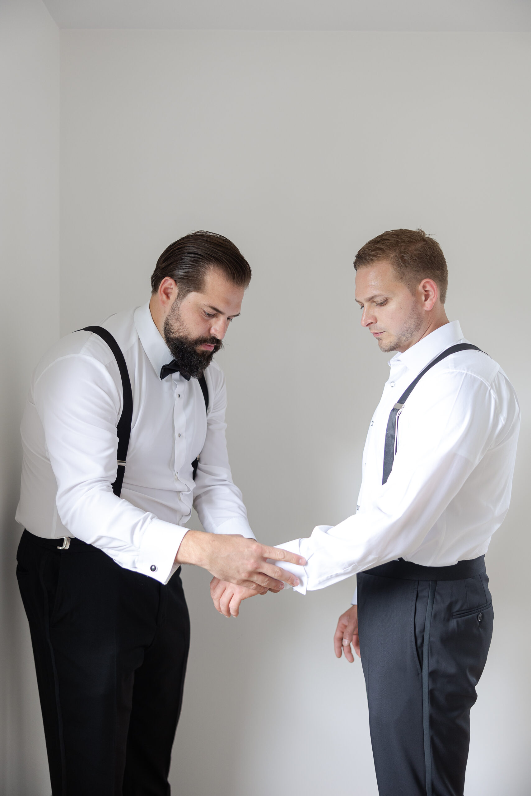 Groom getting ready with his groomsmen for New York Wedding day