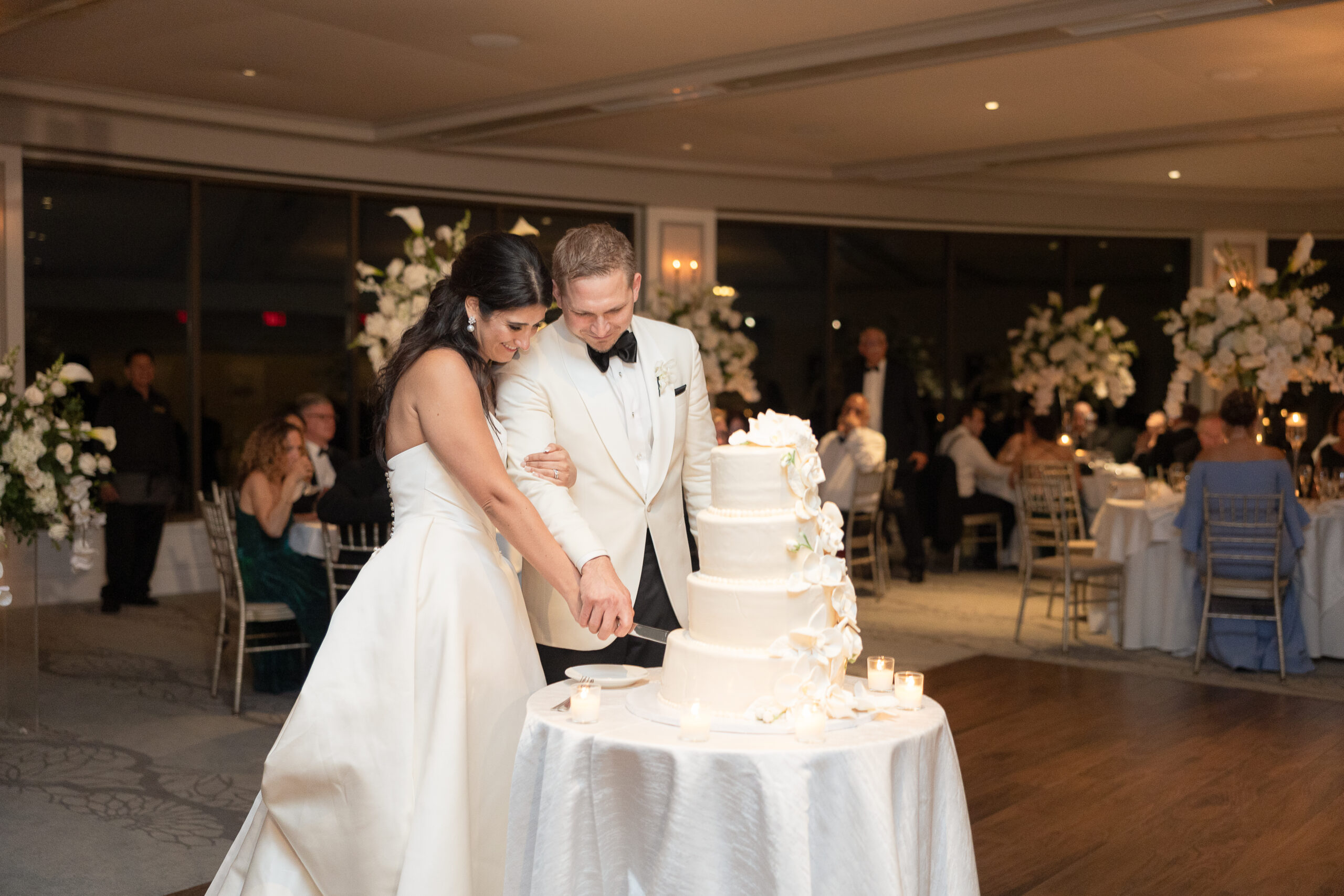 NY Bride and Groom Cutting their Wedding Cake