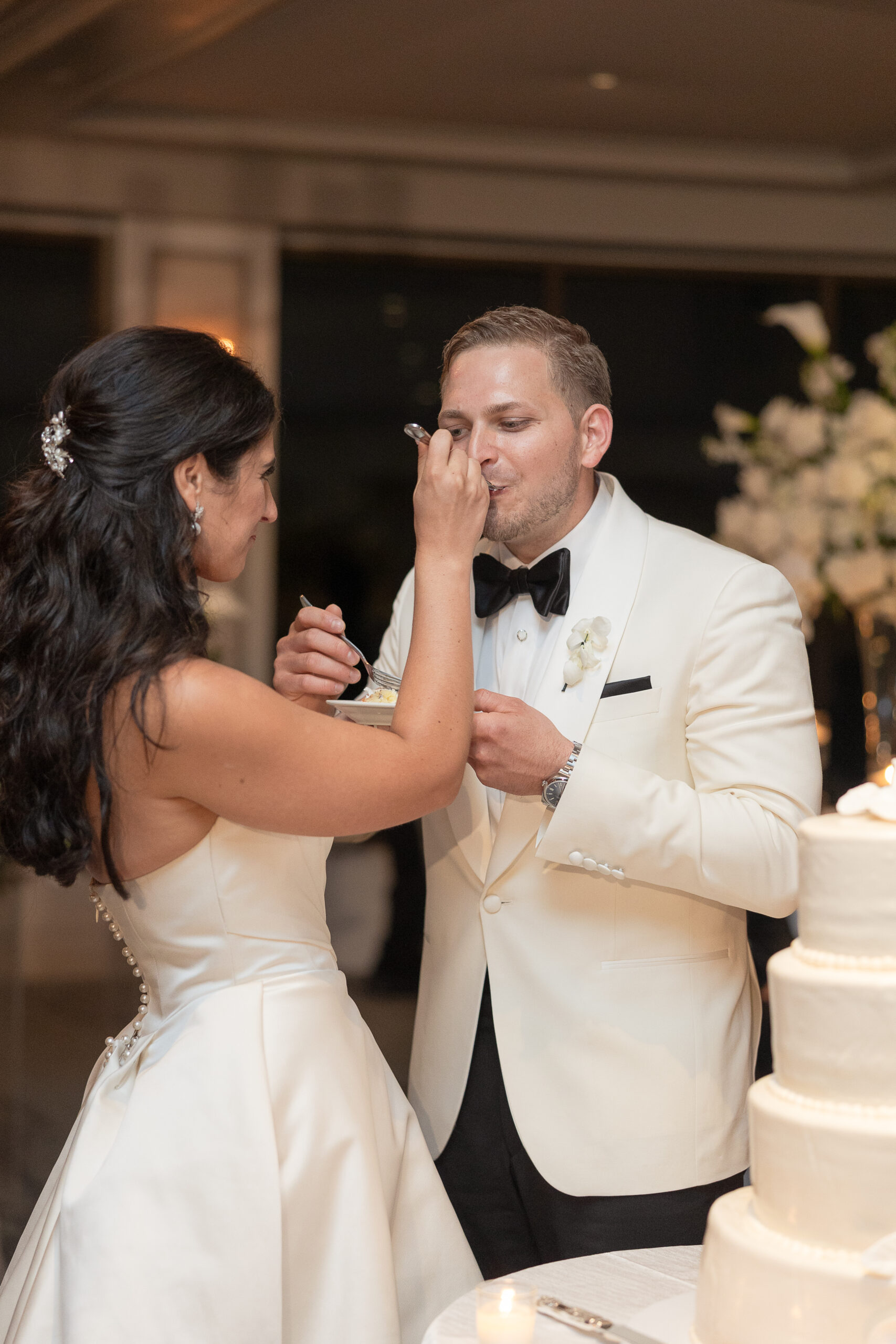NY Bride and Groom Cutting their Wedding Cake