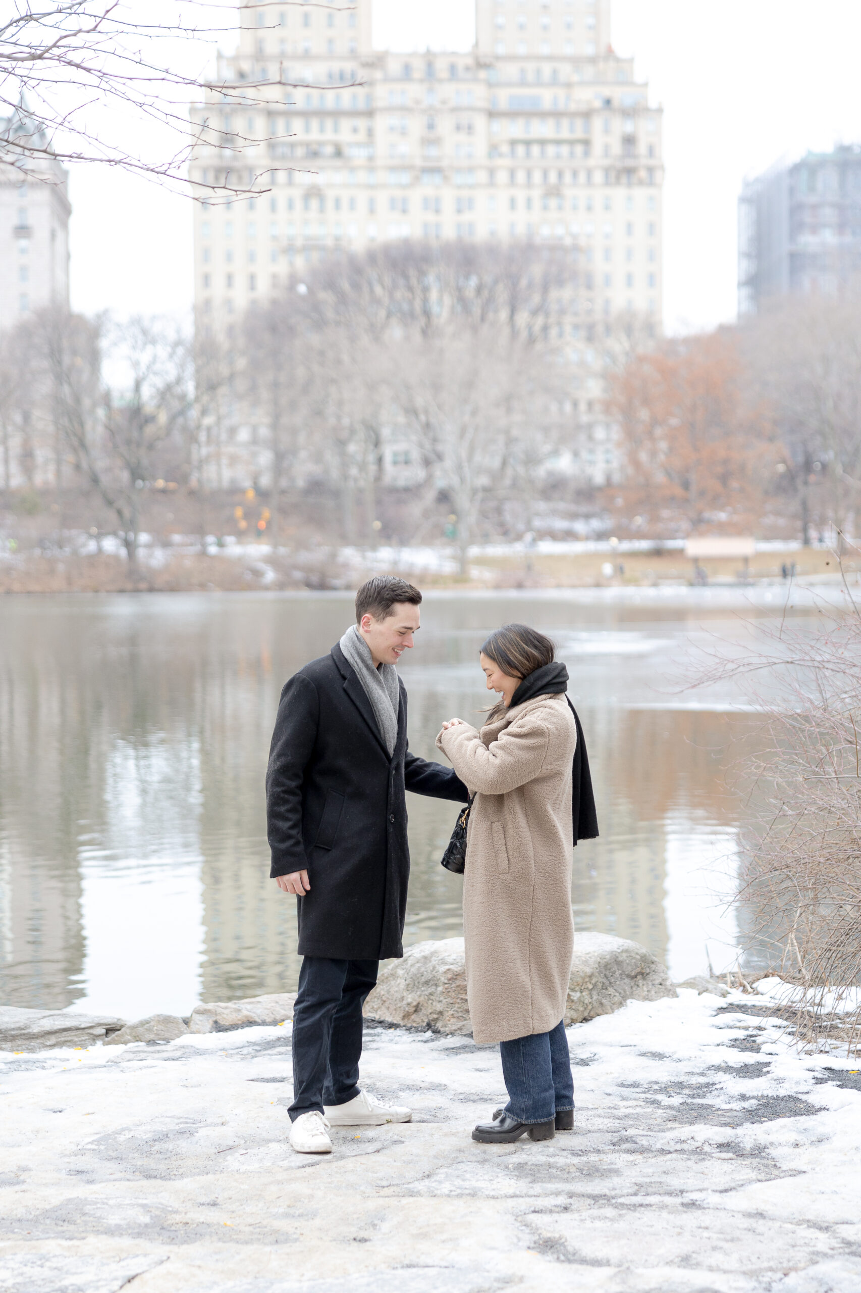 Manhattan proposal with girlfriend reacting to ring