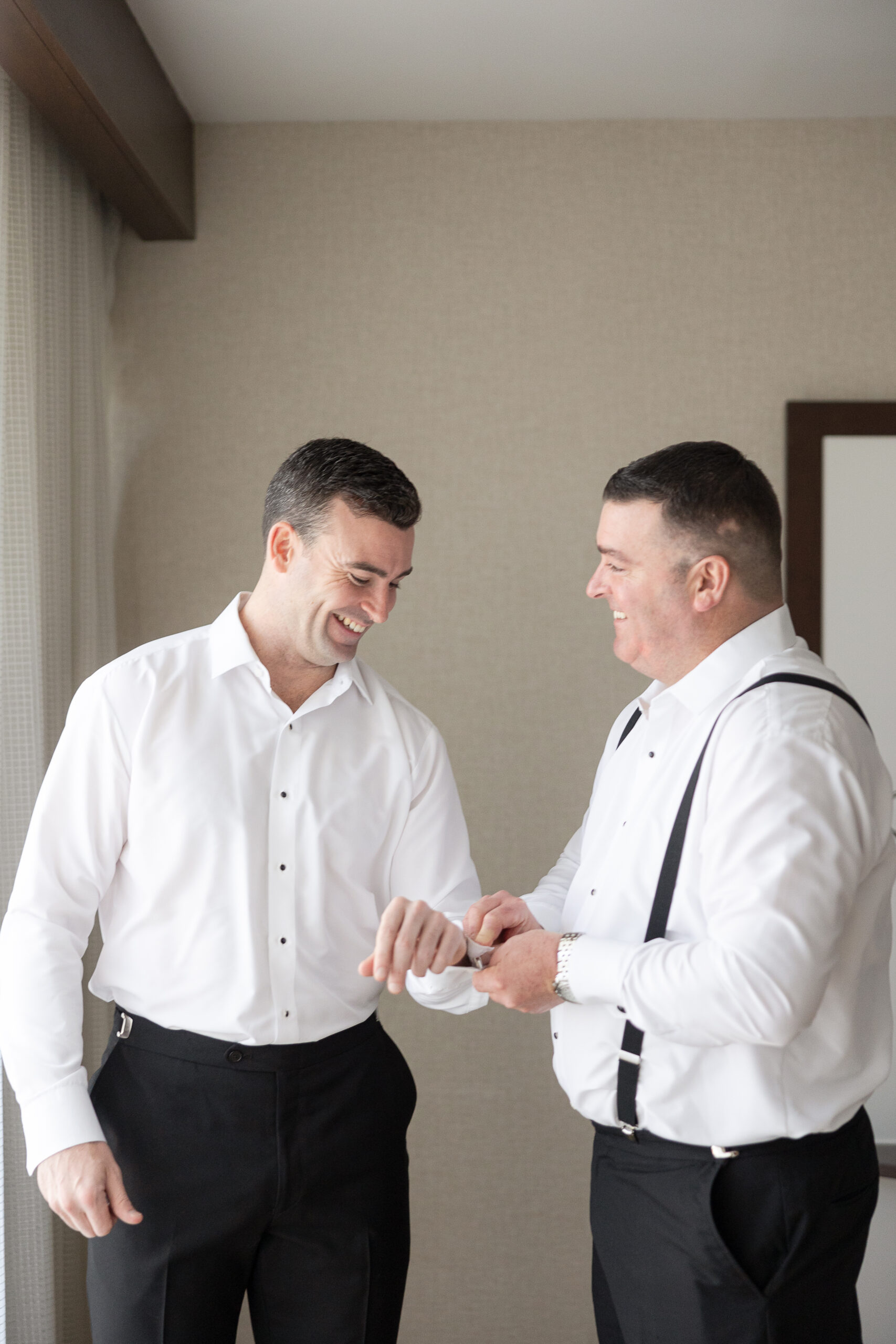 Groom and groomsmen getting ready in Connecticut