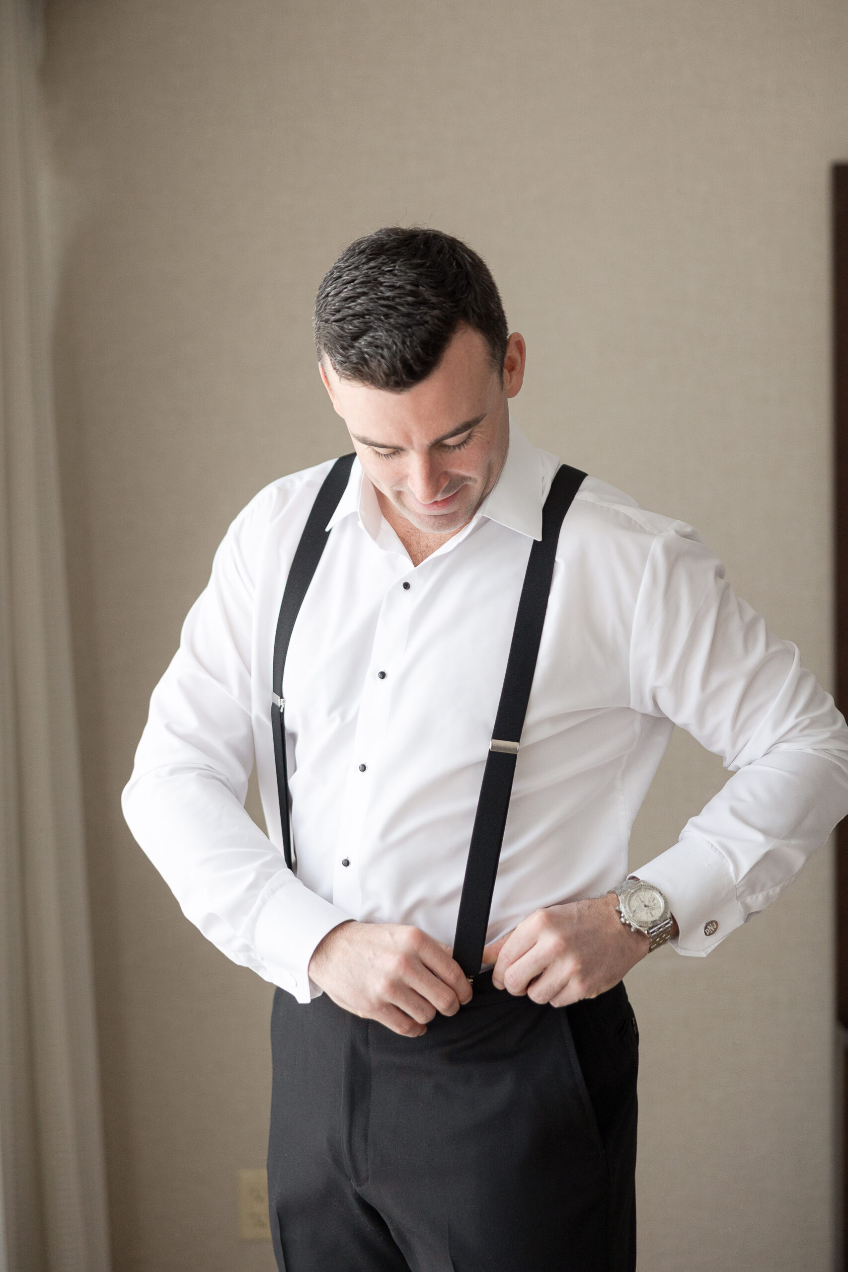 J House Greenwich groom getting ready