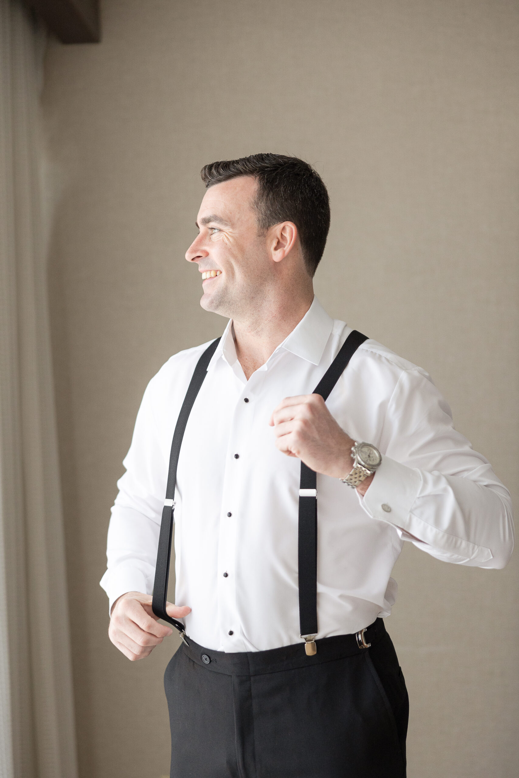 J House Greenwich groom getting ready