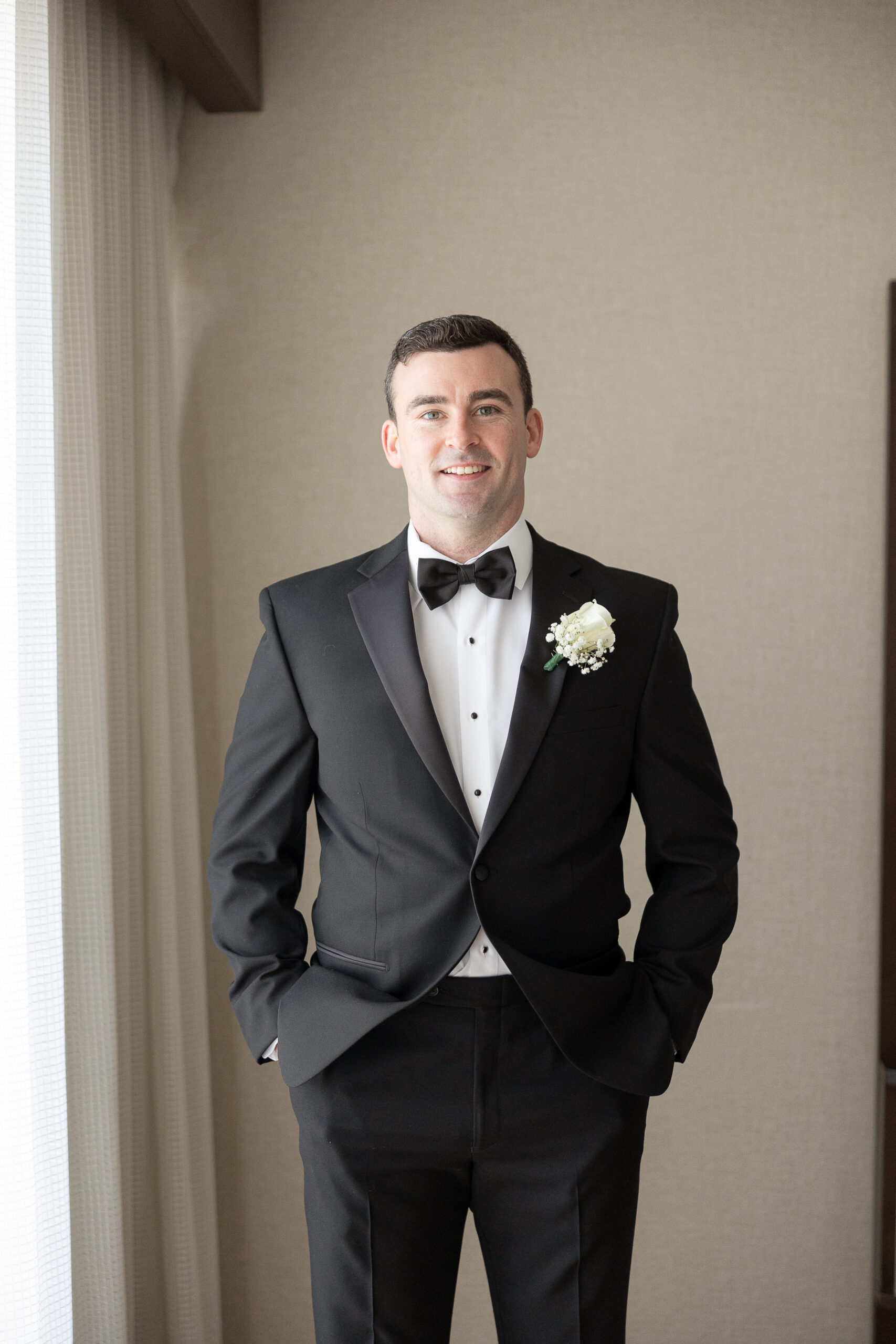 J House Greenwich Groom getting dressed with tux