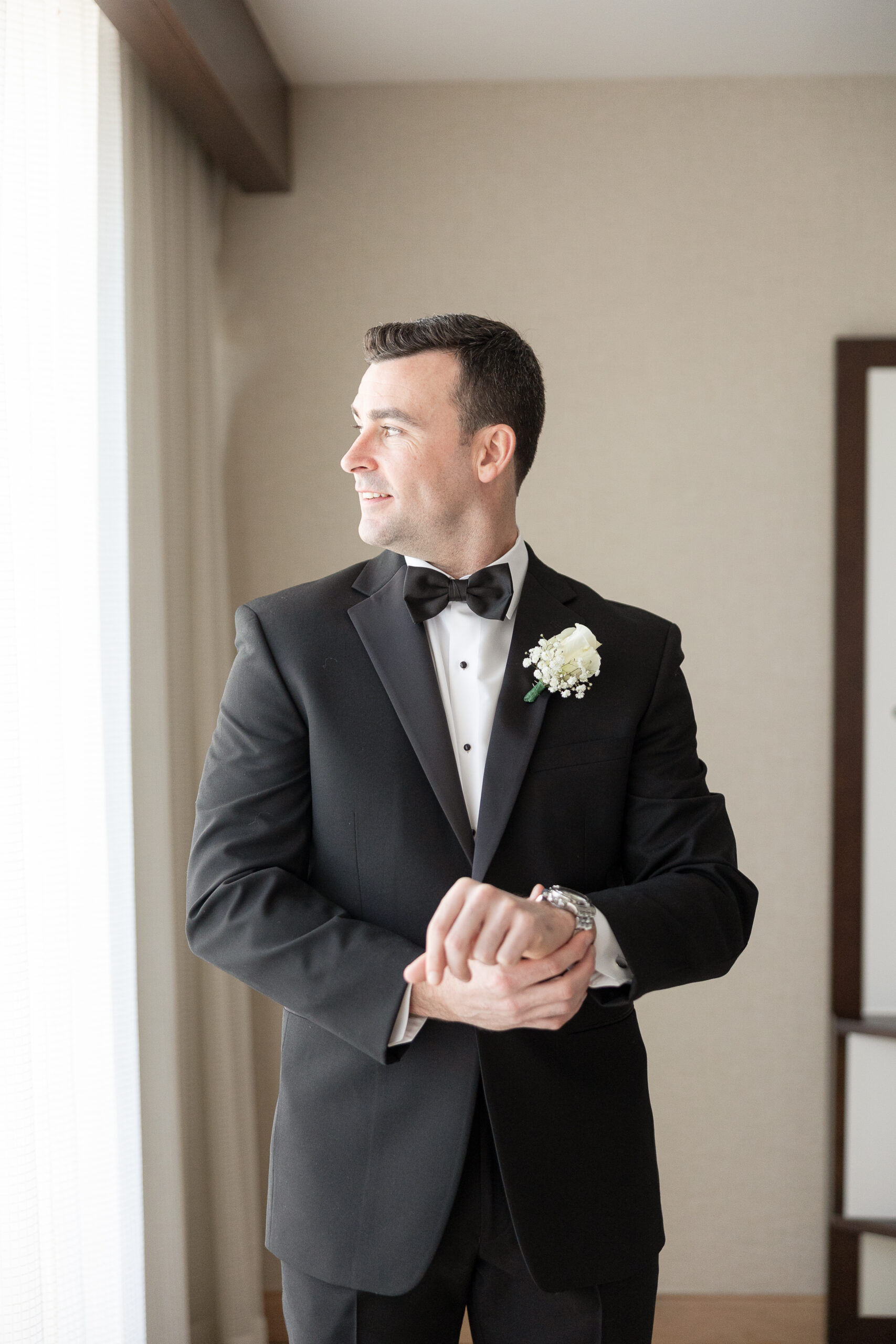 J House Greenwich Groom getting dressed with tux