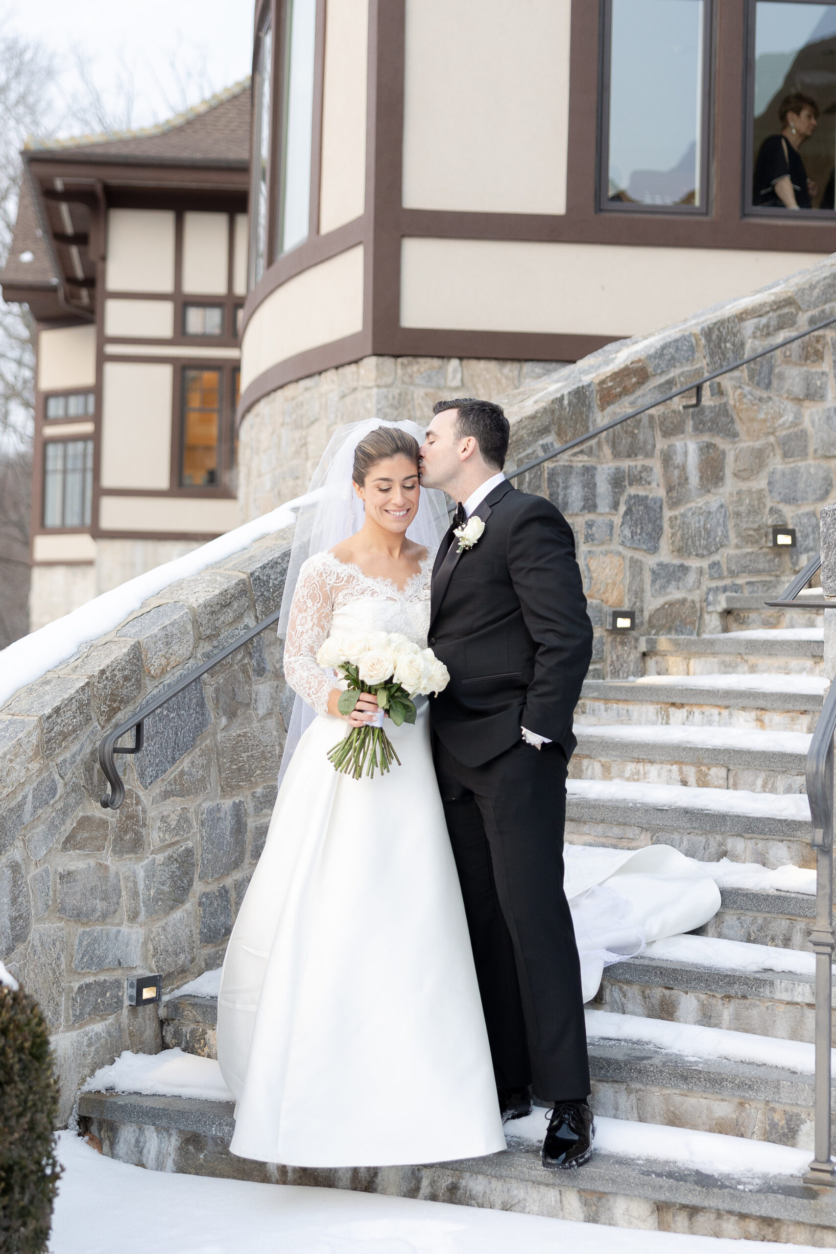 Wedding portraits on stairs at Le Chateau