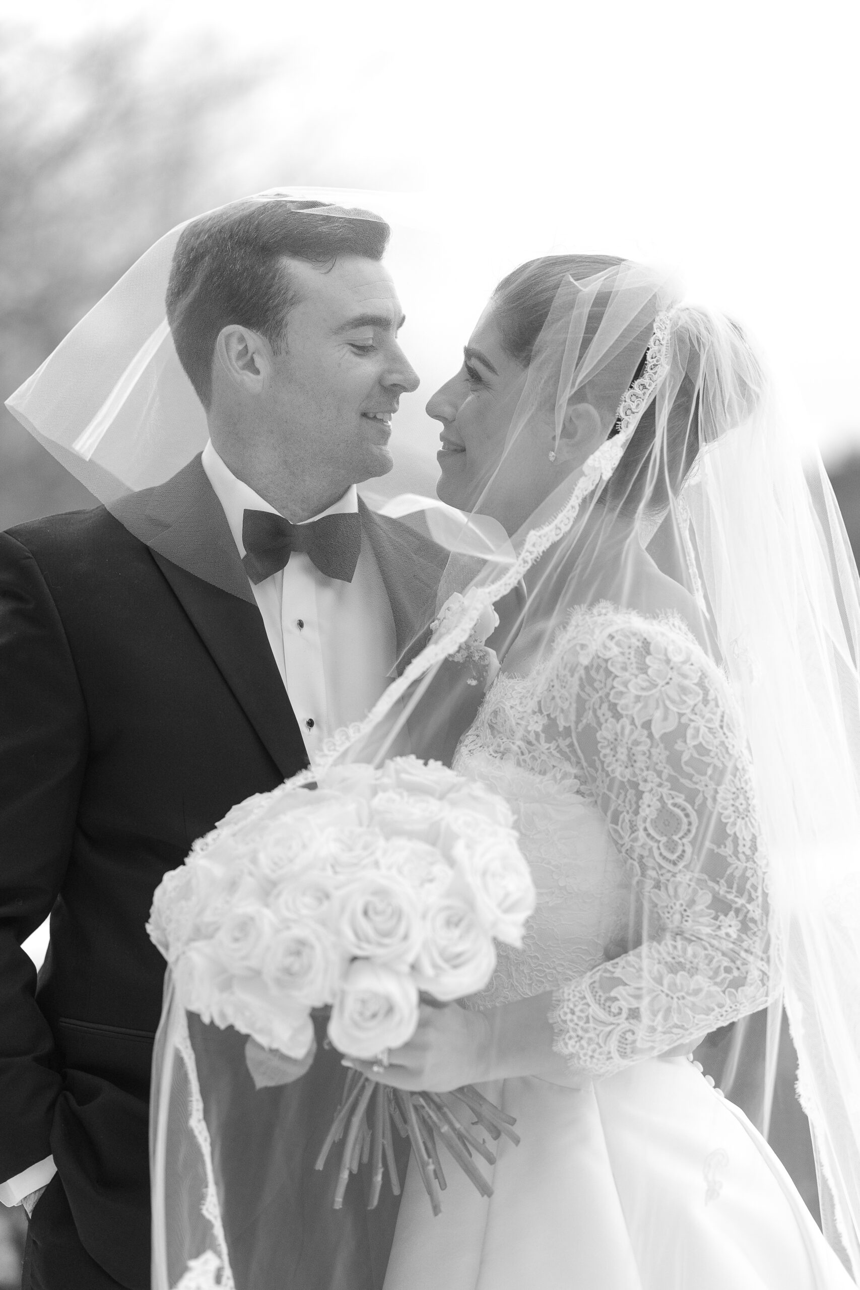 Bride and groom veil moment