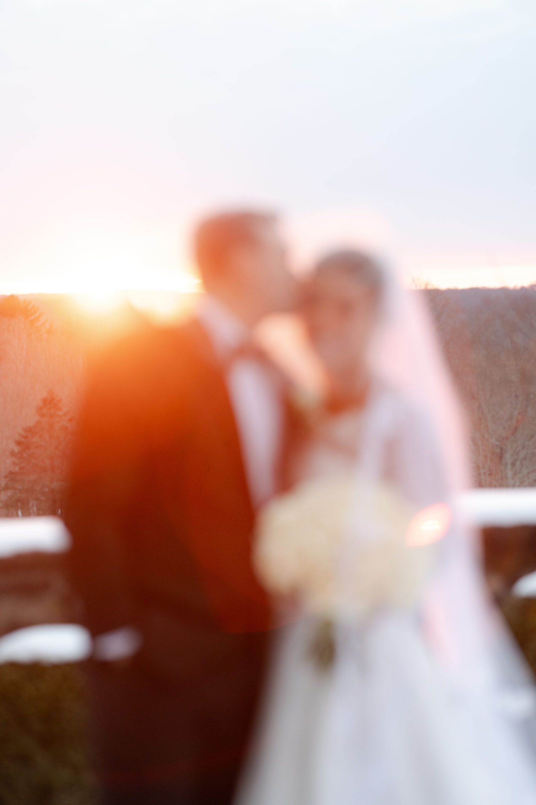 Bride and groom veil moment