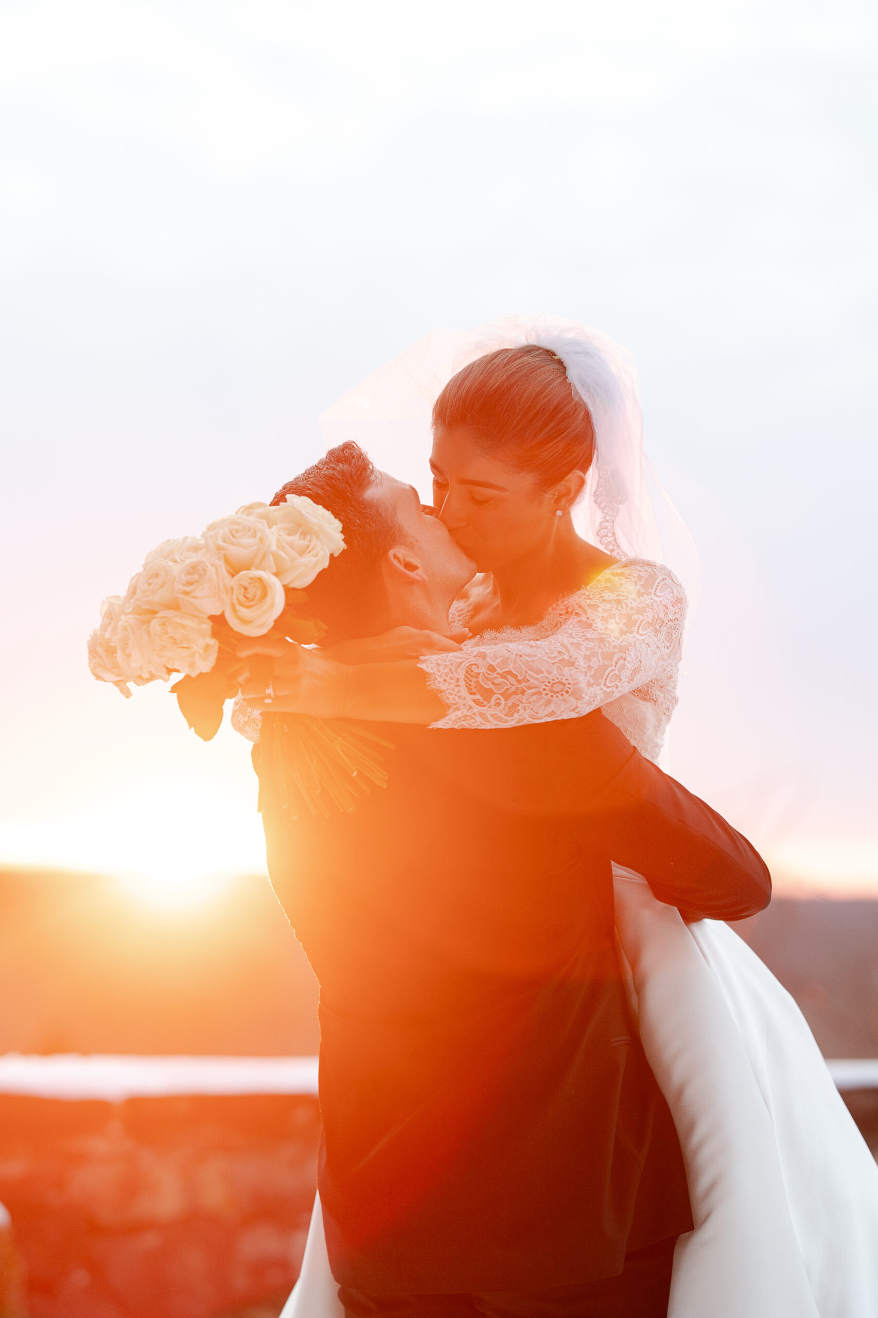 Bride and groom winter portraits with sunset