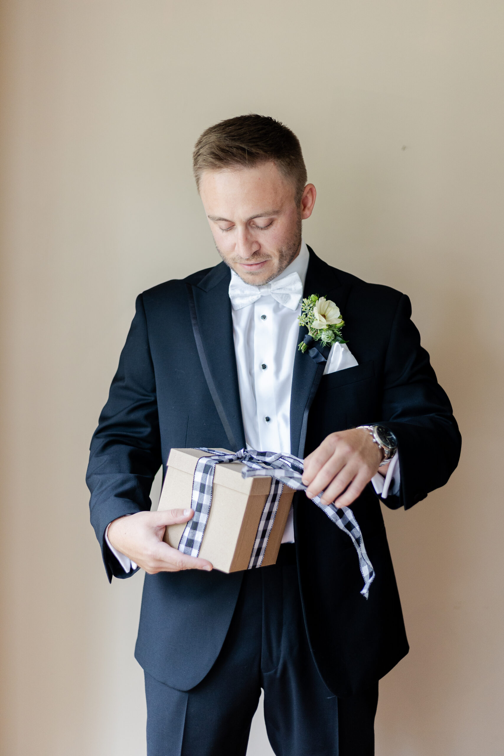 NJ Groom opening gift from bride