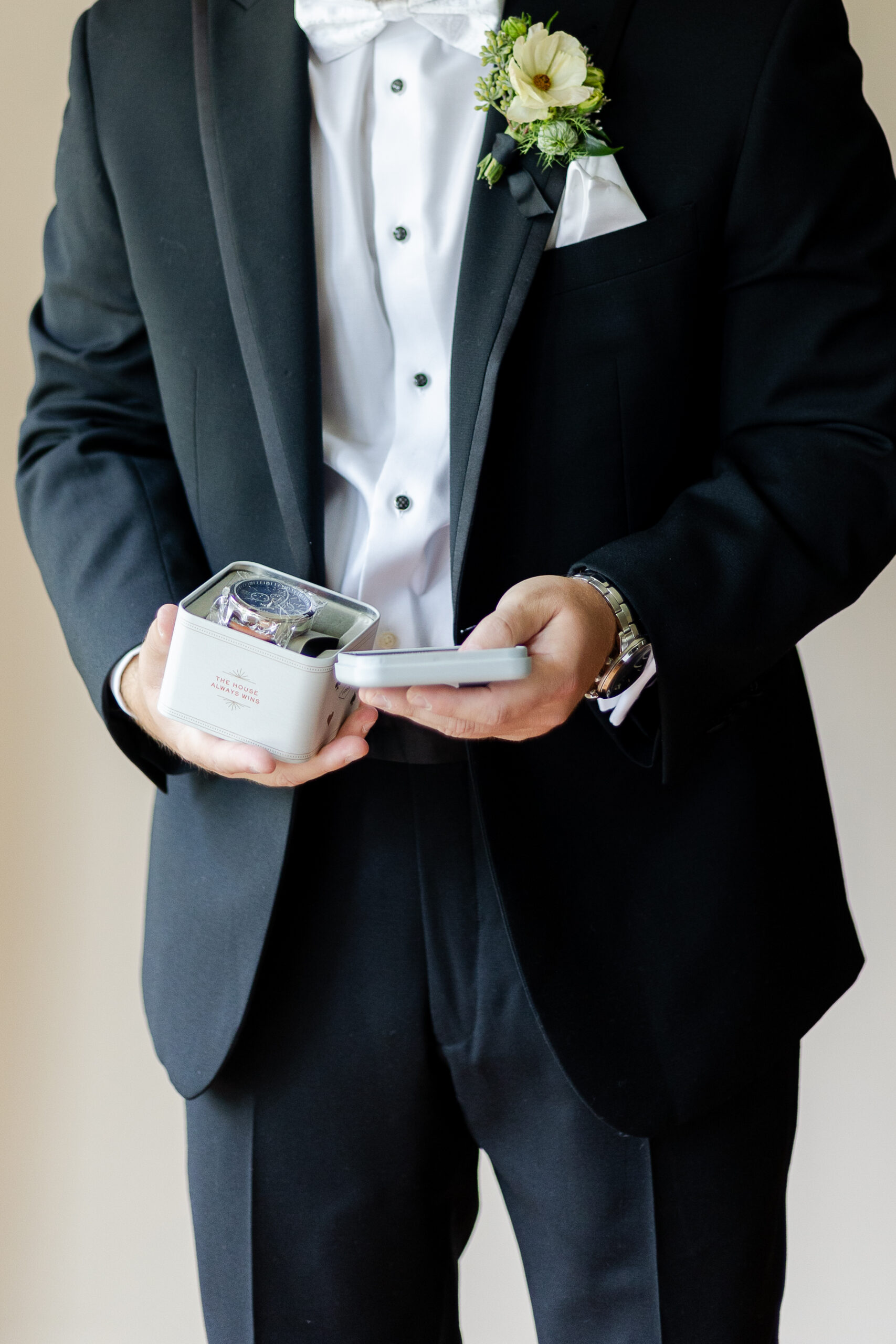 Detailed photo of NJ groom opening gift