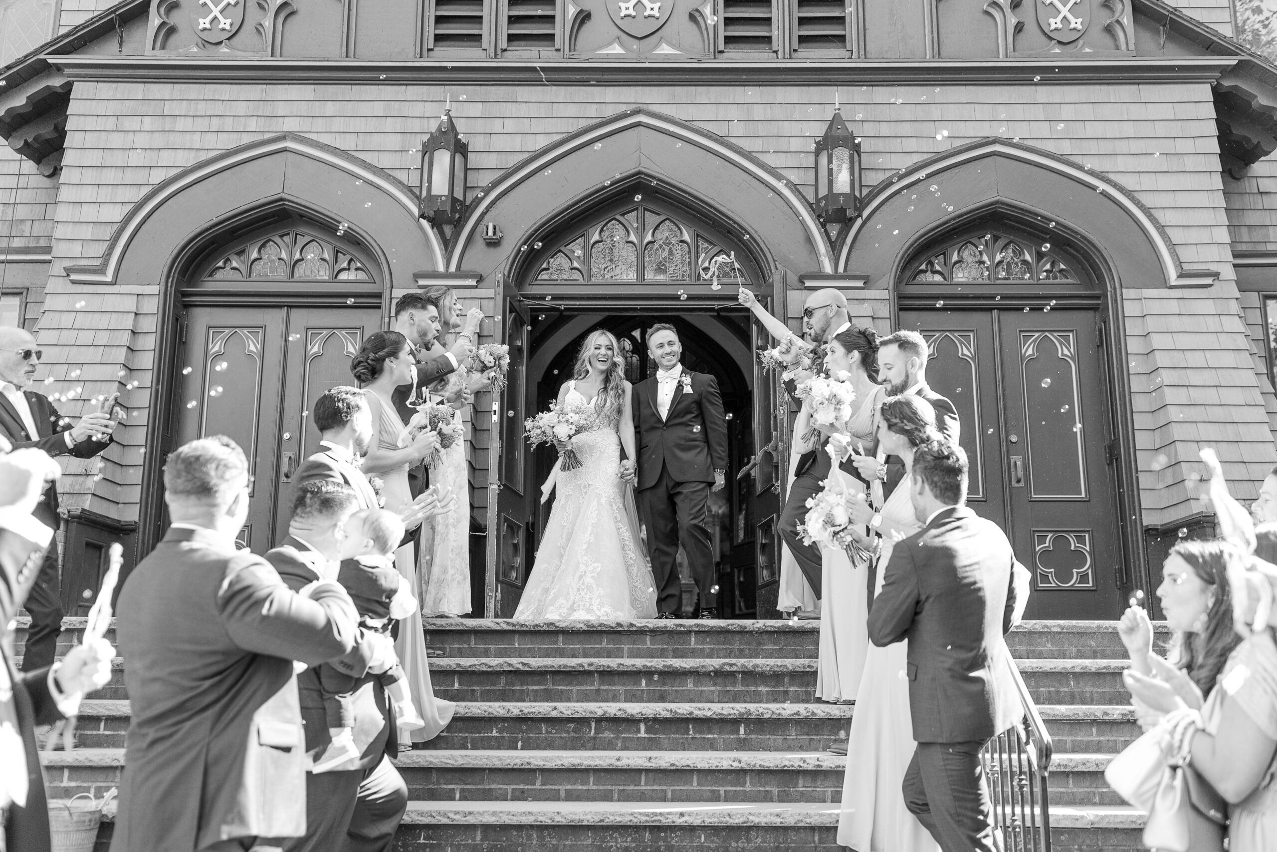 Bride and groom confetti exit