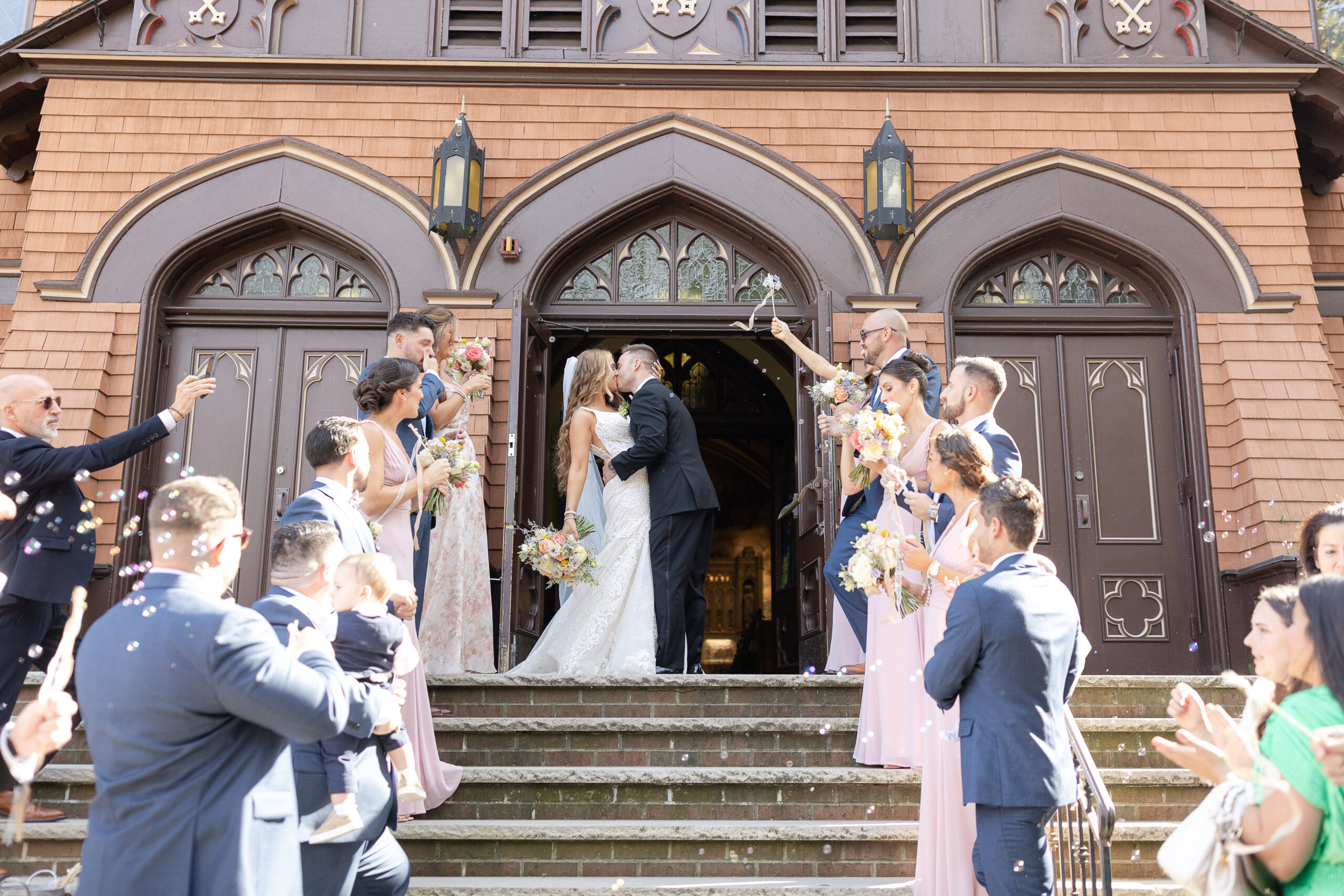 Bride and groom confetti exit