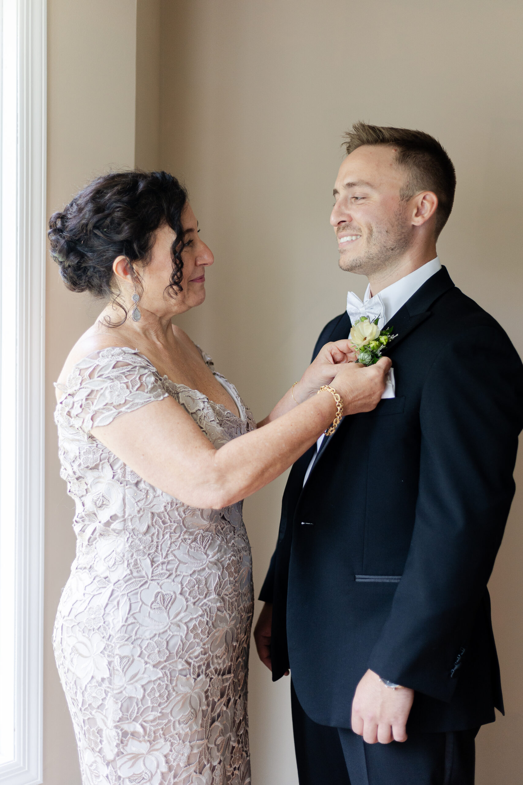 Park Loft Groom Getting Ready with mom