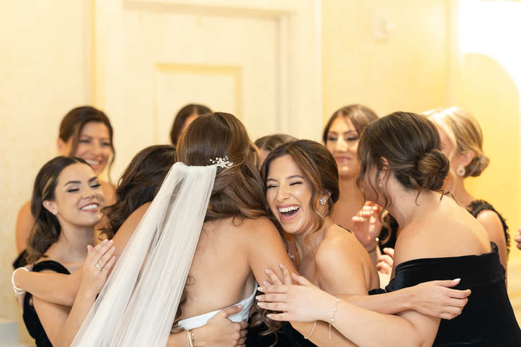 Bride and bridesmaid first look at The Grove