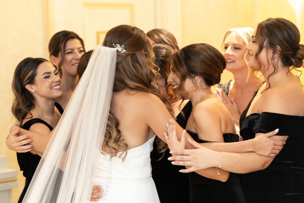 Bride and bridesmaid first look at The Grove
