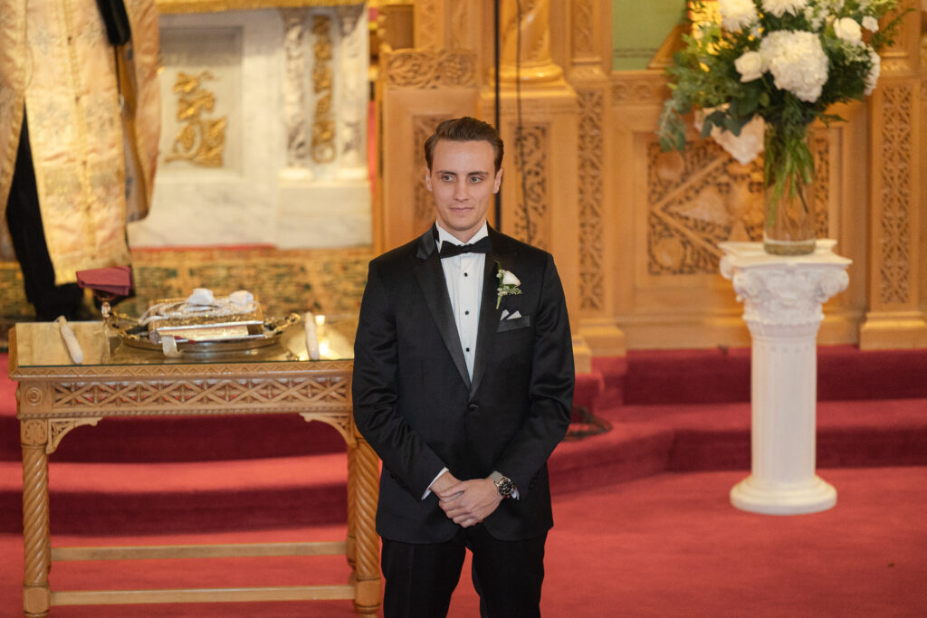 NJ groom waiting at church ceremony