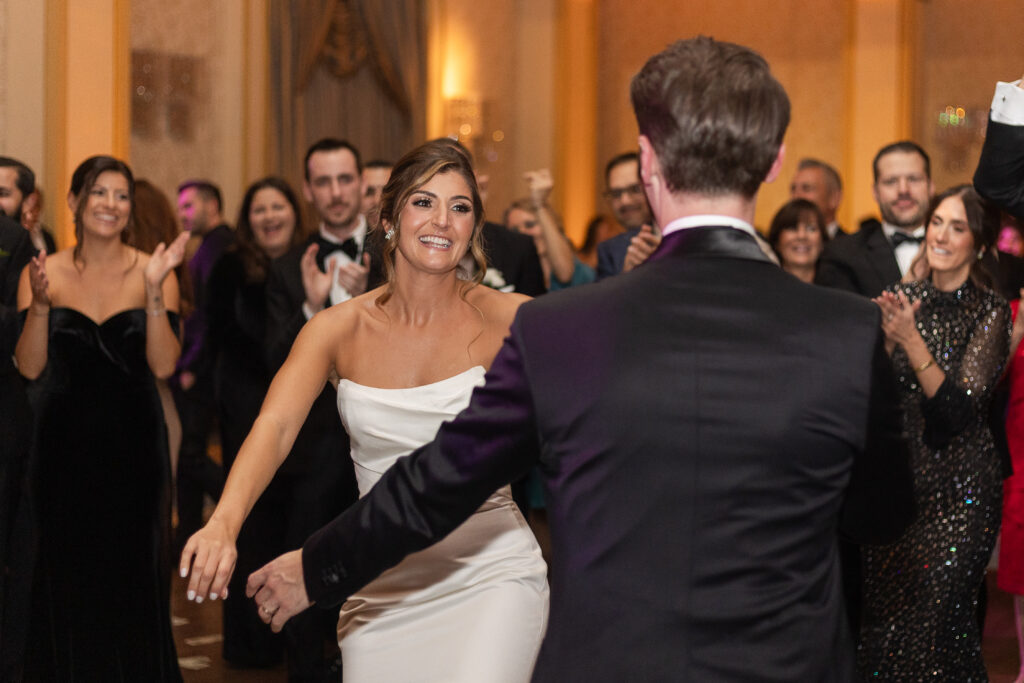 Bride and groom Greek dance at NJ wedding venue