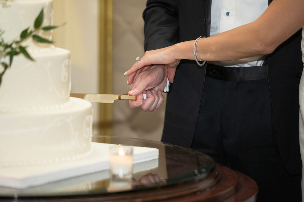 Bride and groom cake cutting