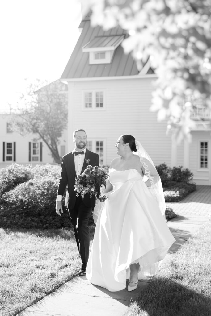 Black and White NJ bride and groom in front of The Cottage