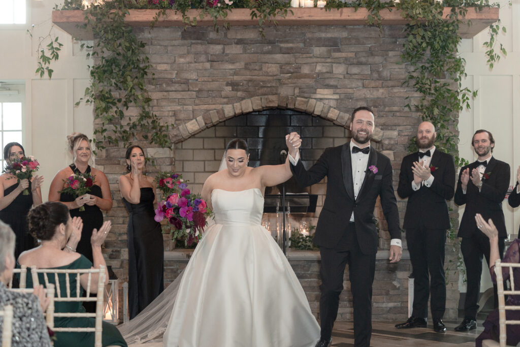 Bride and groom walking down the aisle