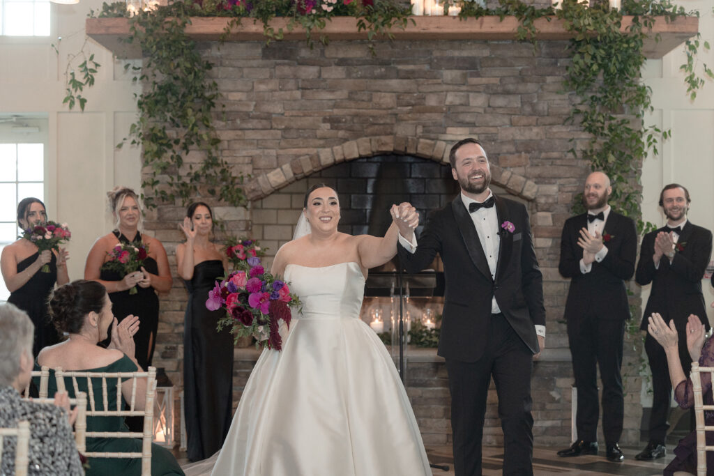 Bride and groom walking down the aisle