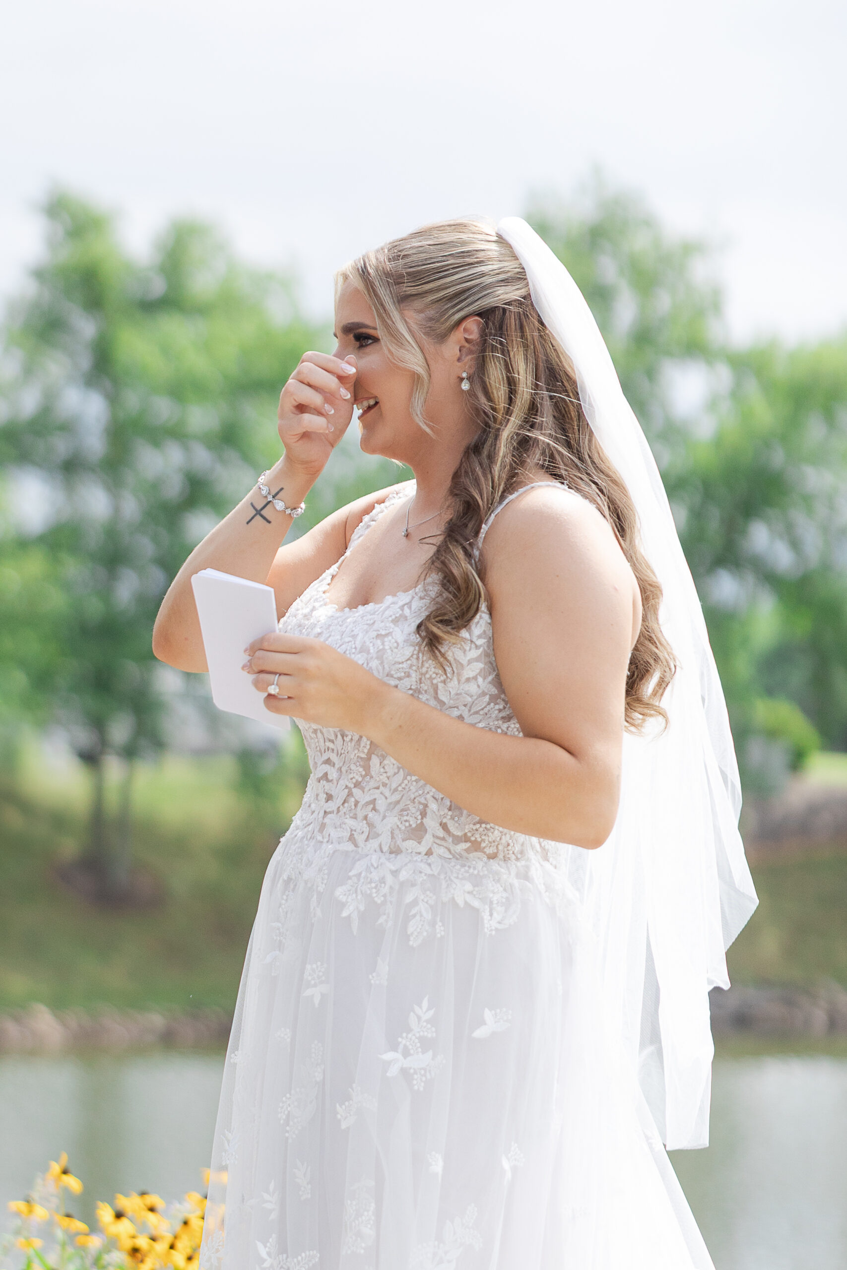 Bride reading private vows to groom