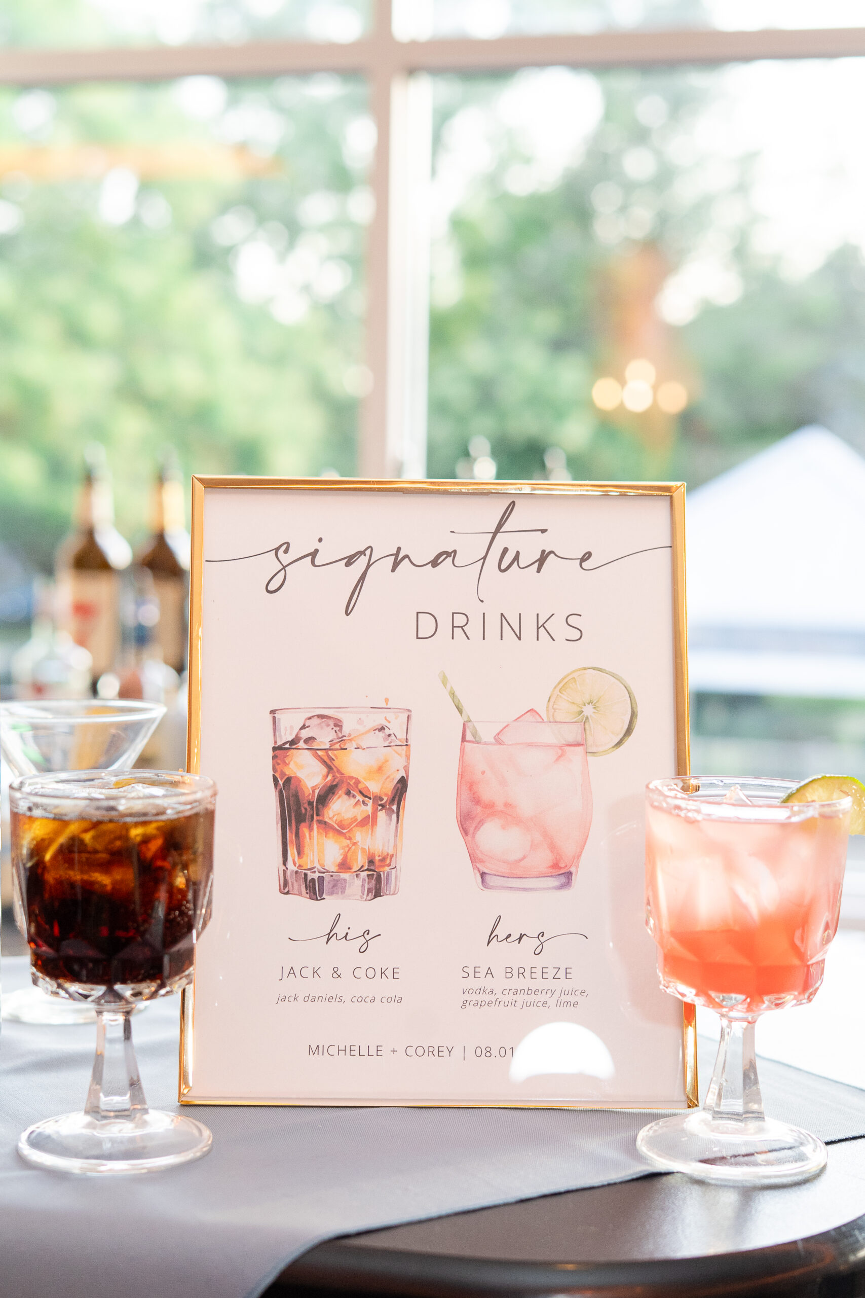 Indoor wedding cocktail hour signature drinks